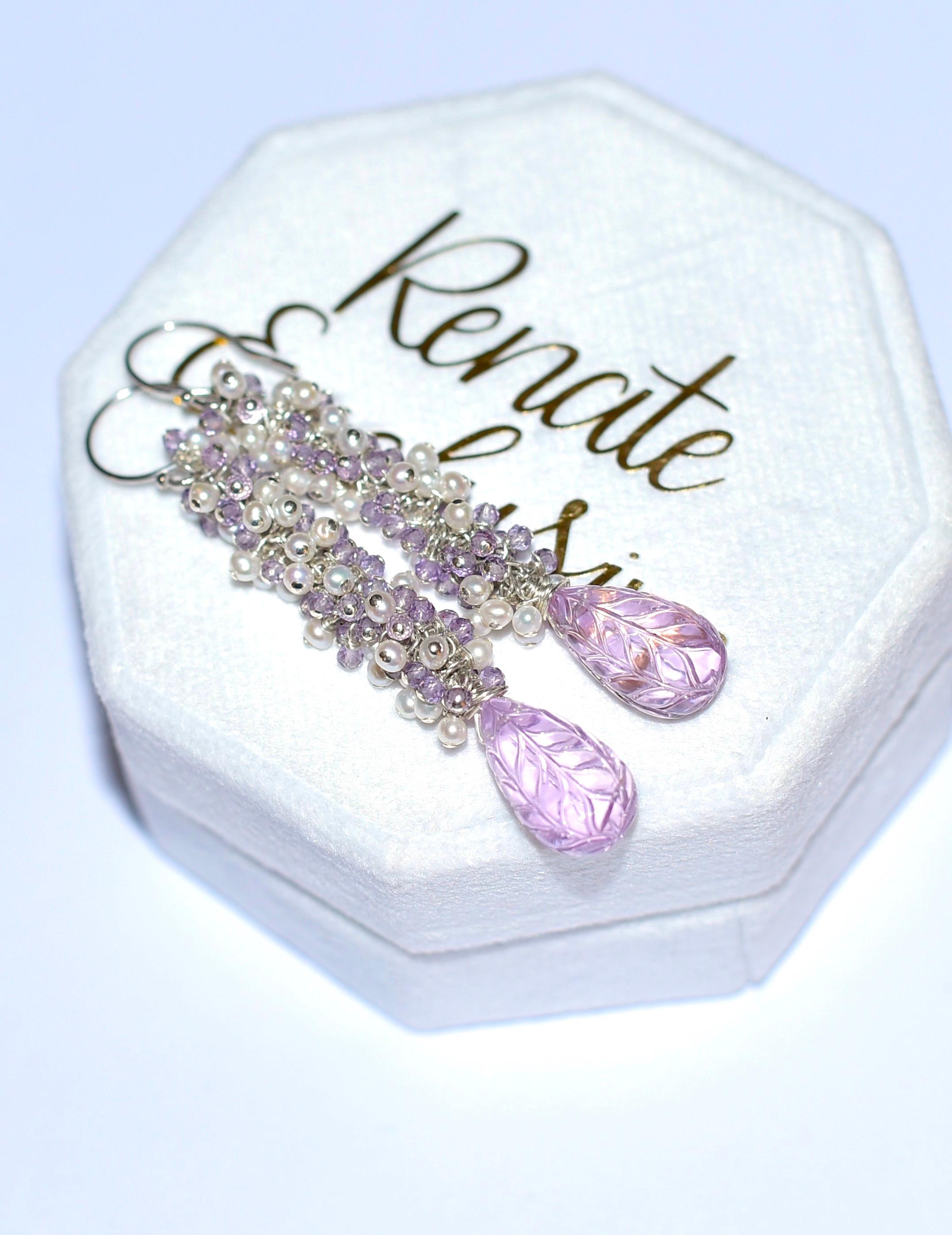 Elegant and long Kunzite Carving Carved Floral Leaf Bead with dozens of Amethyst and Seed pearl beads. Incredible elegant and festive earrings for a special Lady! 
Kunzite beads are absolutely gorgeous and rare; transparent, and luxurious what your