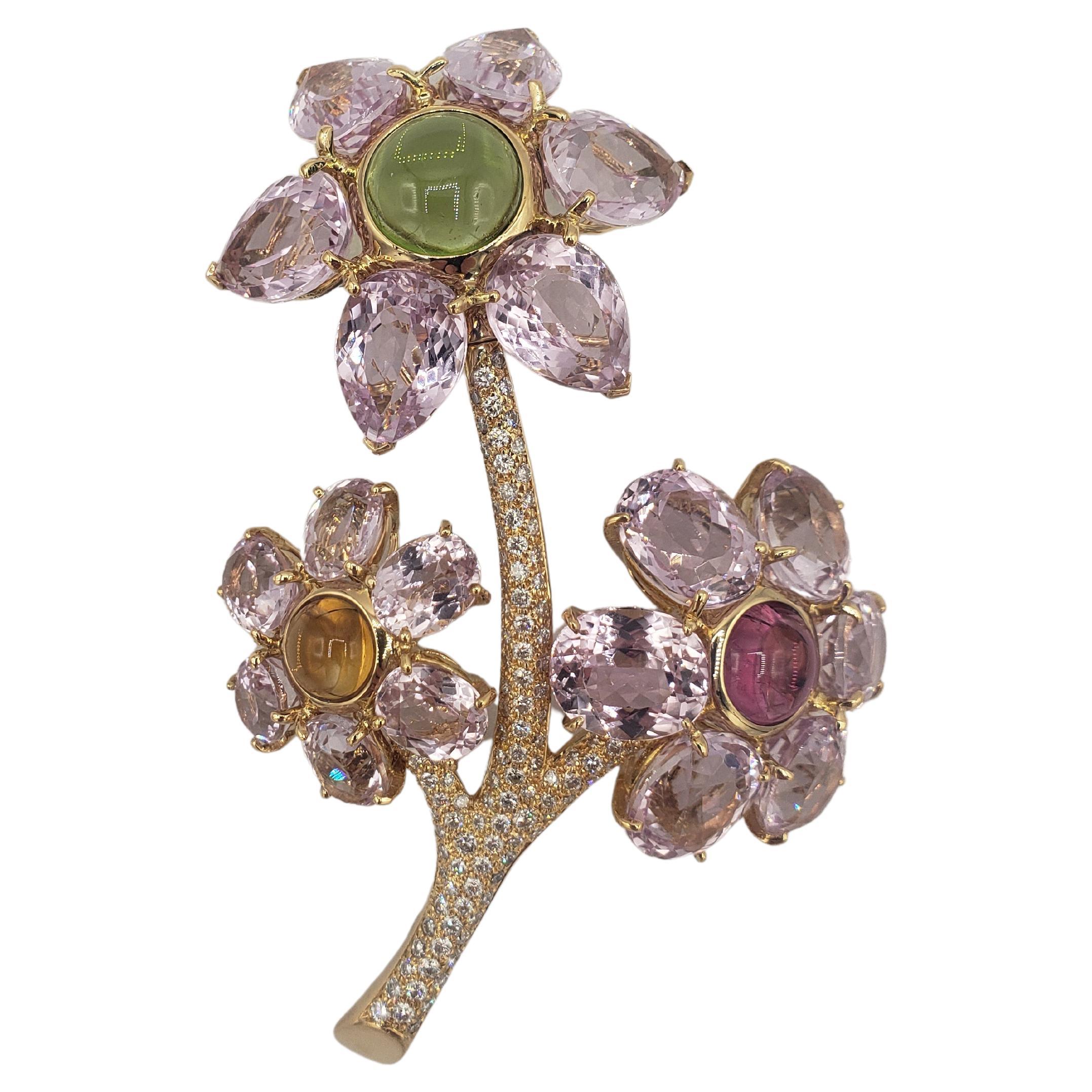 Add a touch of elegance to any outfit with this stunning 18K solid yellow gold flower brooch from LaFrancee. The exquisite pear-shaped kunzite and 21 tourmaline gemstones are set in a pavé style, creating a beautiful multicolor floral design. The
