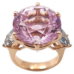 Bague en kunzite et aigue-marine sertie en or rose 14 carats