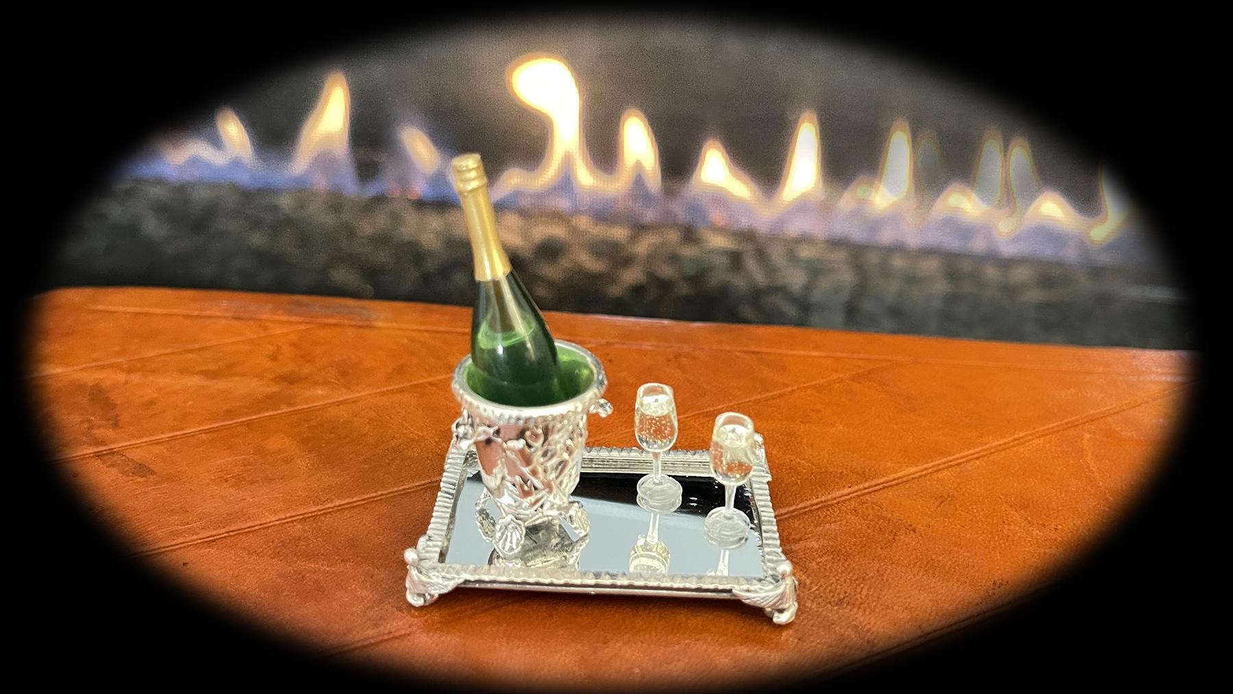 Champagne For Celebration!
Sterling Silver Champagne Bucket and Mirrored Tray
set includes: bucket, tray, champagne bottle, 2 glasses, plexi-display case with display block.

For the first time in over 30 years, we are thrilled to present three