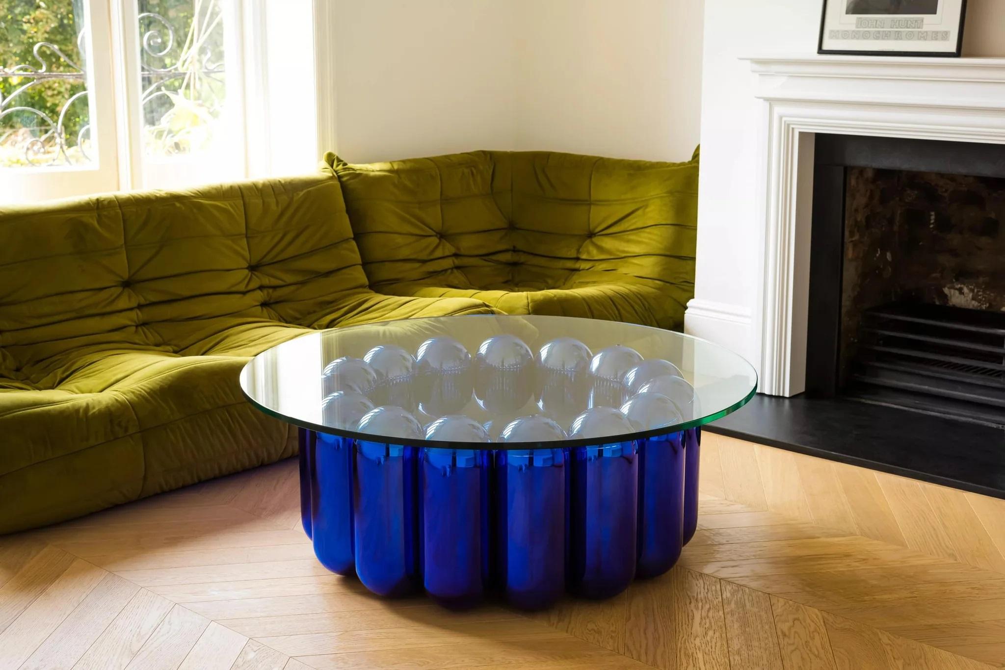 Kupoli Couchtisch 15 von Cameron Design House
Abmessungen: T 112,8 x H 40 cm.
MATERIALIEN: Stahl, Glas.

Erhältlich in anderen Abmessungen.
Erhältlich in lackierter oder verchromter Ausführung. Bitte kontaktieren Sie uns.

Der Kupoli Couchtisch ist