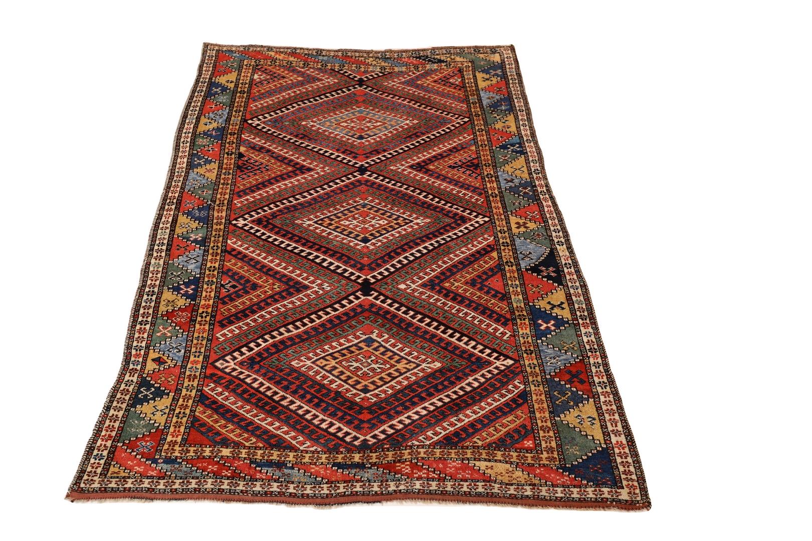 Indulge in the utmost luxury and prestige with our exquisite Kurdish Rug, a rare gem that transcends the ordinary and transports you to a world of opulence and refinement. This rug is not merely a floor covering – it is a testament to the highest