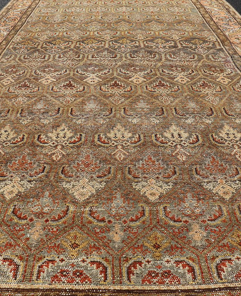 Persian Kurdish Antique Gallery Runner with All-Over Tribal Design in Brown's and Pink For Sale