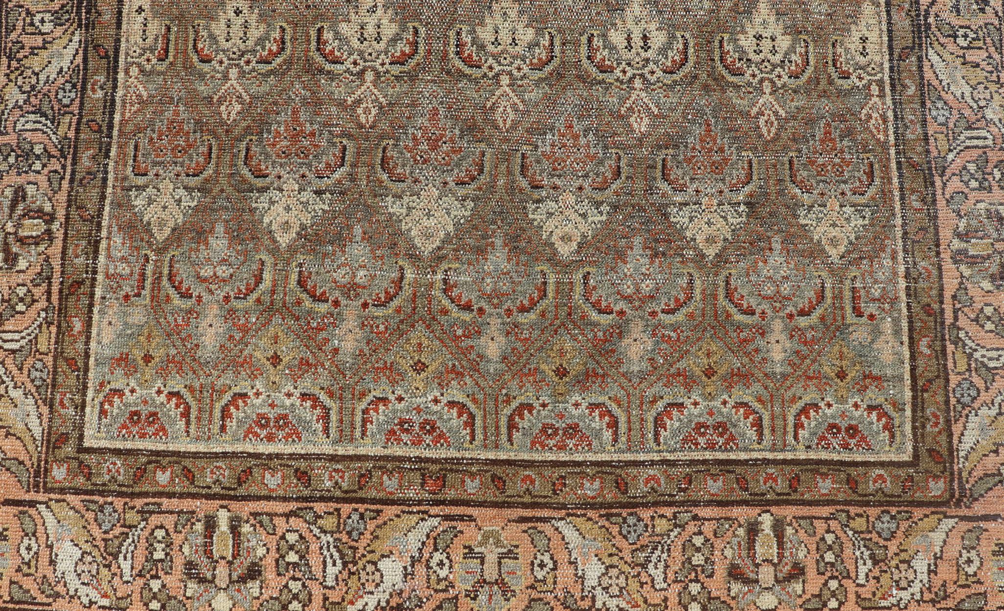 20th Century Kurdish Antique Gallery Runner with All-Over Tribal Design in Brown's and Pink For Sale