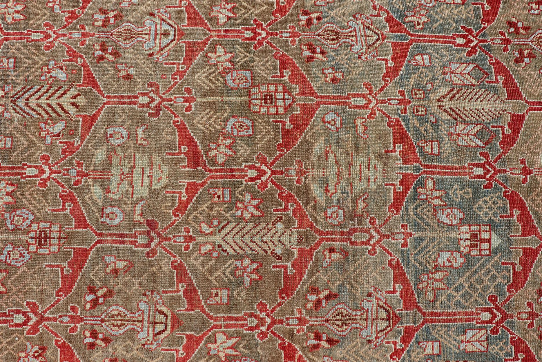 20th Century Kurdish Antique Gallery Runner with Tribal Design in Light Green, Tan and Red For Sale