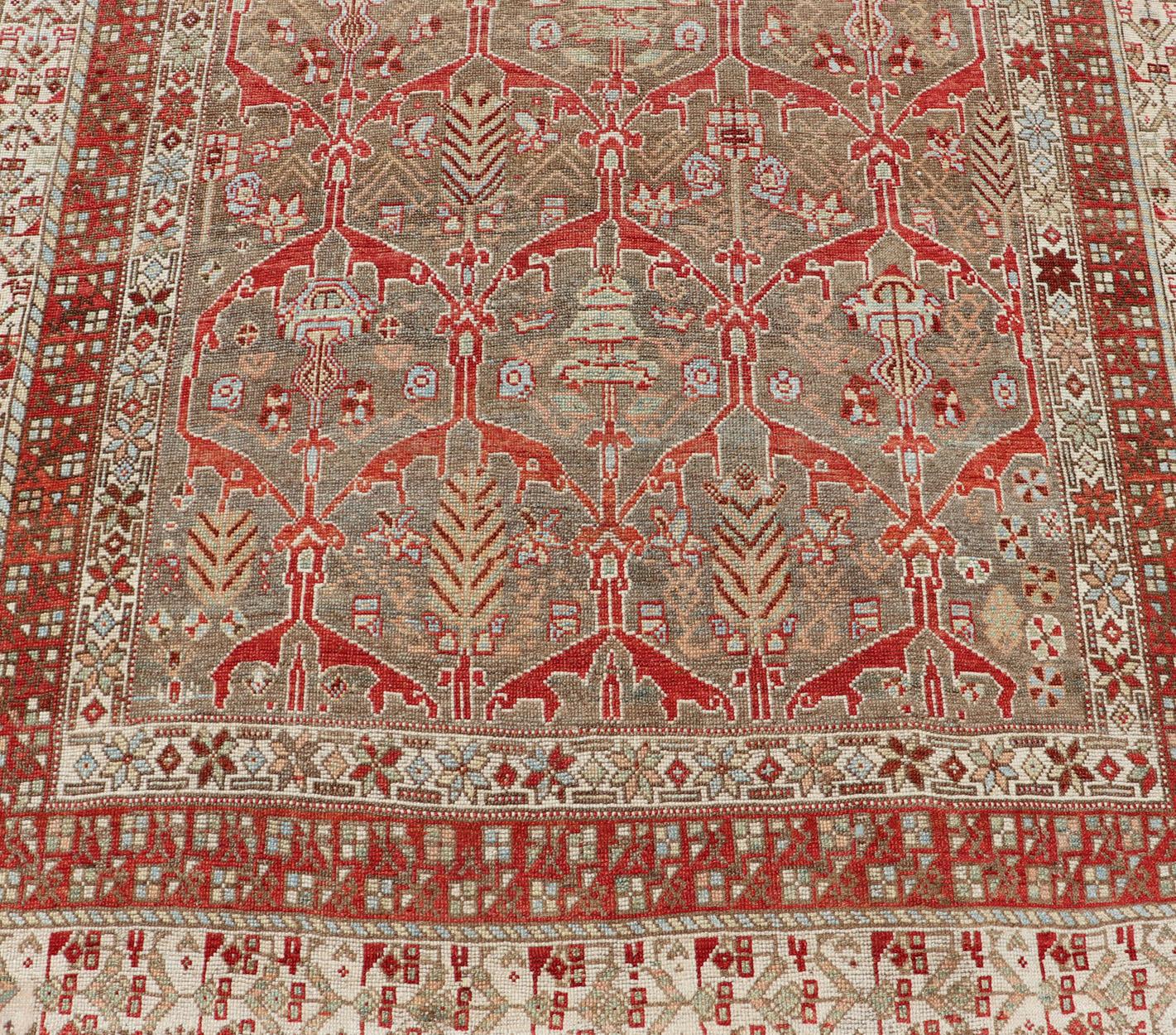 Kurdish Antique Gallery Runner with Tribal Design in Light Green, Tan and Red For Sale 2