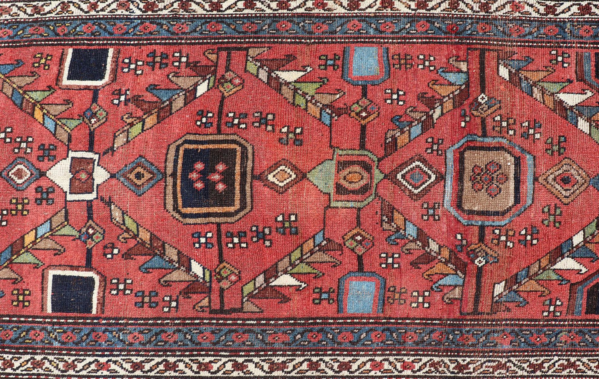 Hand-Knotted Kurdish Antique Runner in Vibrant Red Background and Multi-tiered Border For Sale