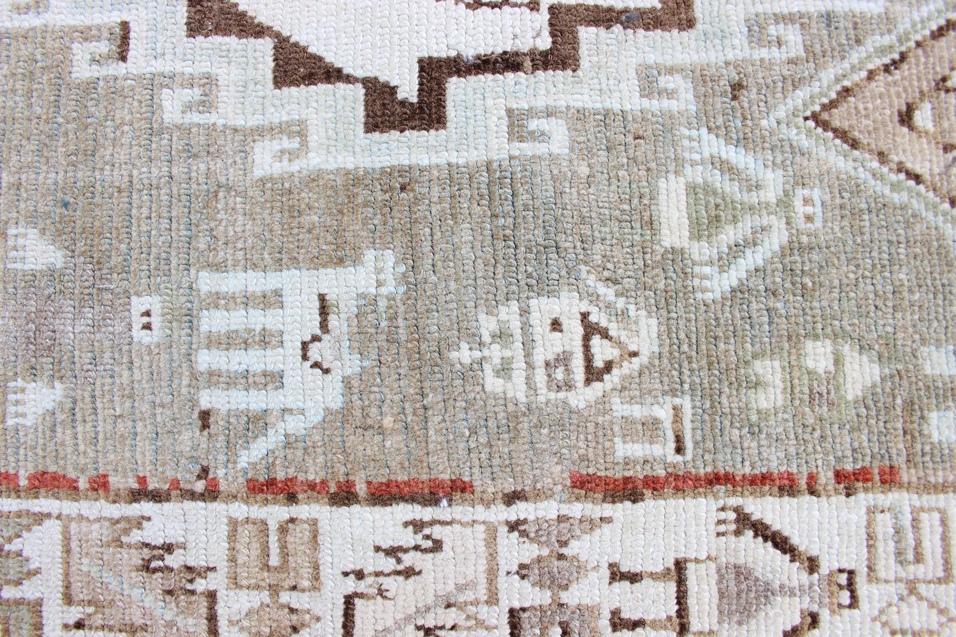 20th Century Kurdish Antique Runner with Tribal Design in Light Green, Taupe & Orange-Red For Sale