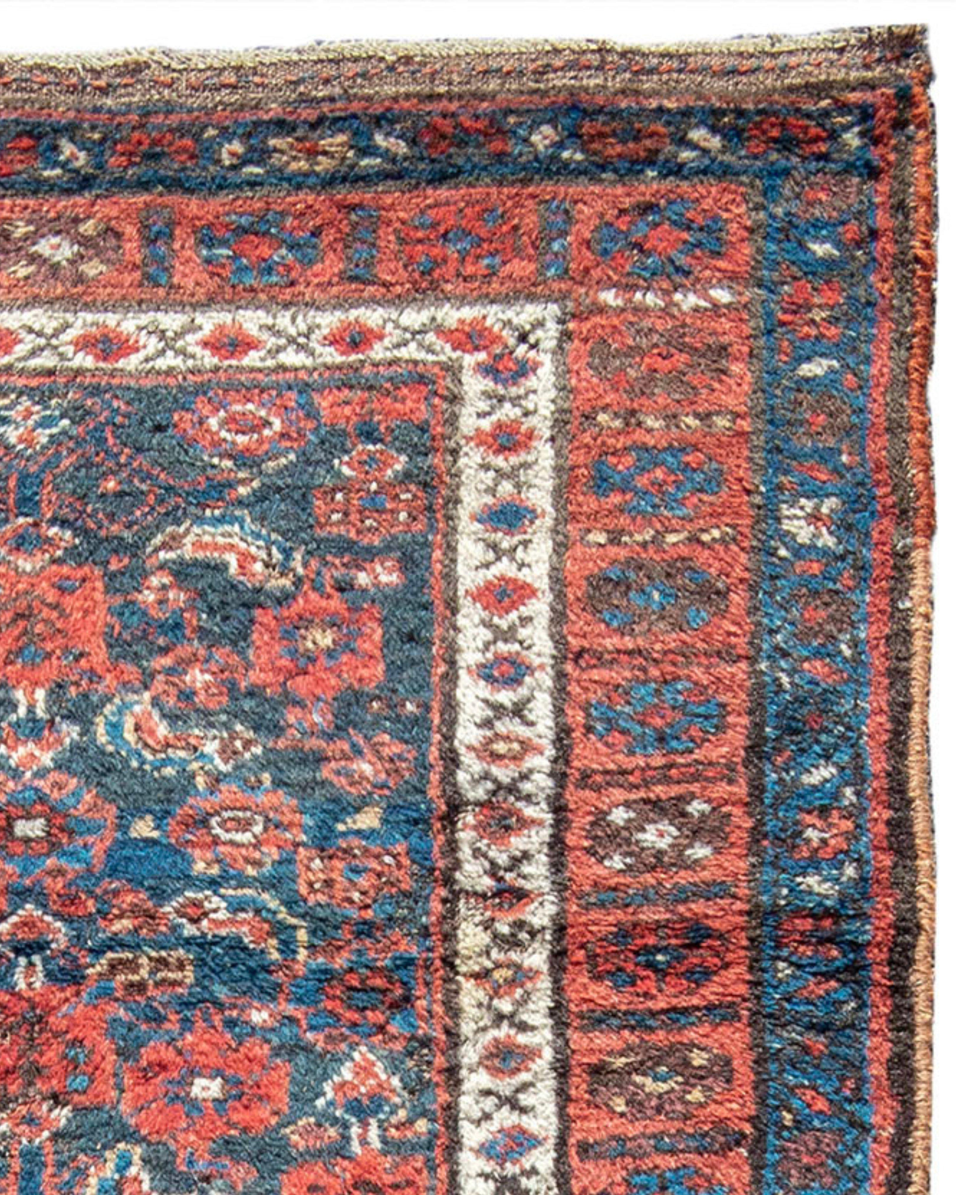 Kurdish Rug, c. 1900. 

Slight wear and a small break in selvedge to be repaired at point of sale.

Additional Information:
Dimensions: 3'9