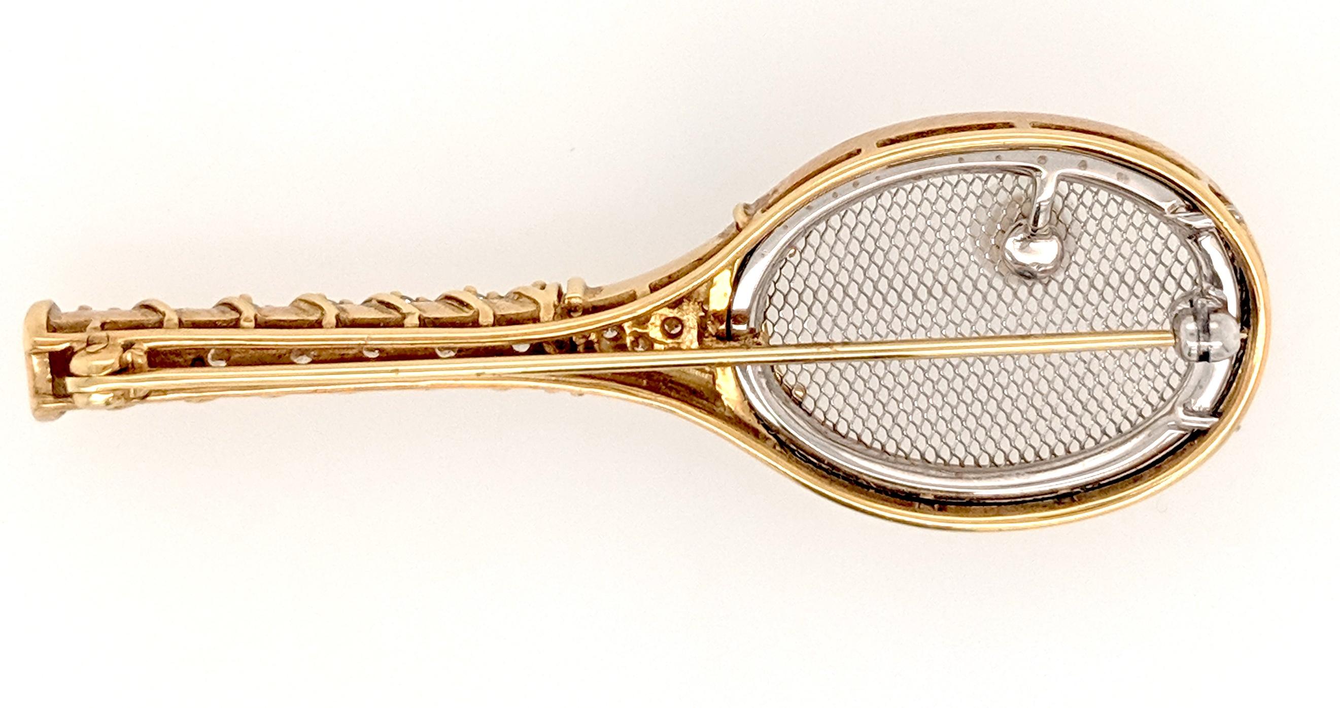 A Kurt Gaum Diamond tennis pin crafted in 18k yellow gold and Platinum featuring (24) brilliant round diamonds weighing approximately .68cttw with a color of F/G and a clarity of VS2. The racket is made in 18k yellow gold and the strings are all