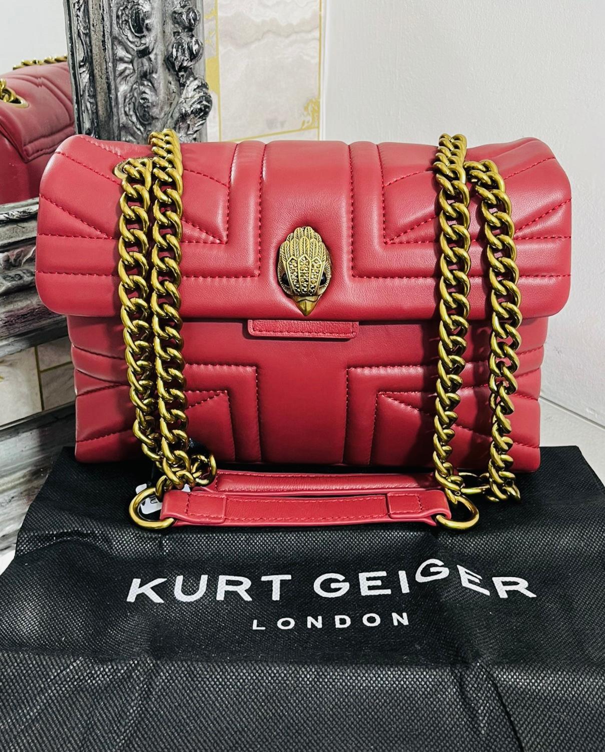 Brand New - Kurt Geiger Kensington Union Jack Leather Bag

Red burgundy shoulder bag crafted from soft quilted leather shaped into Union Jack.

Detailed with aged gold Eagle head on a flap magnetic closure.

Featuring chain strap that can be doubled