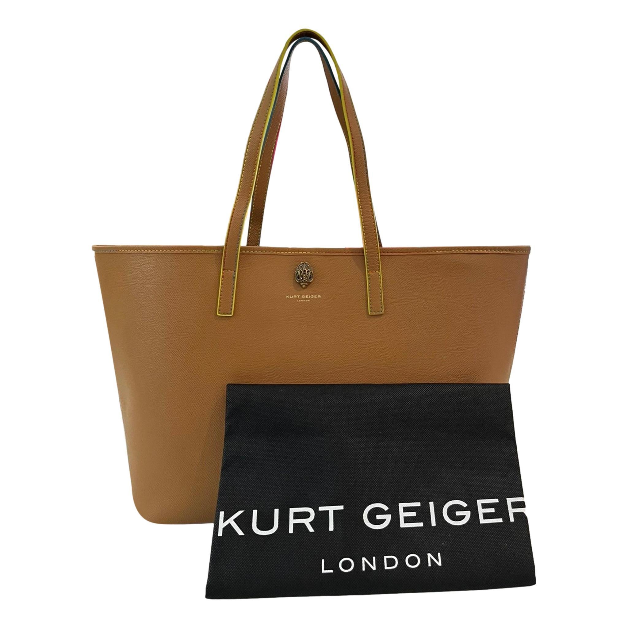 Brand New - Kurt Geiger Richmond Eagle Leather Shopper Bag With Rainbow Stitching

Brown tote bag crafted in textured leather and detailed with rainbow stitching.

Designed with signature antiqued brass Eagle head encrusted with crystals.

Featuring