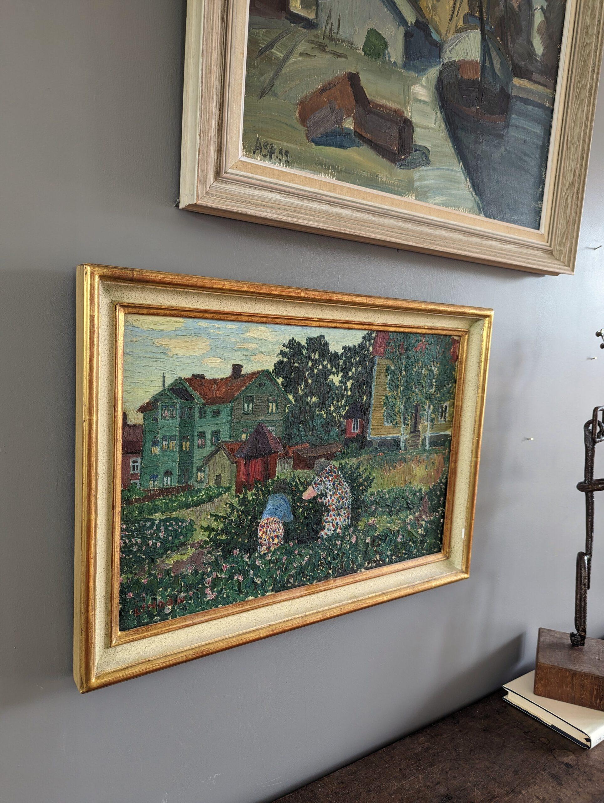SUMMER GARDEN
Size: 34 x 47.5 cm (including frame)
Oil on Board 

A quaint and homely mid-century modernist landscape composition, painted in oil onto board and dated 1943 on the reverse, by Swedish artist Kurt Lindon (1910-1985), whose works can be