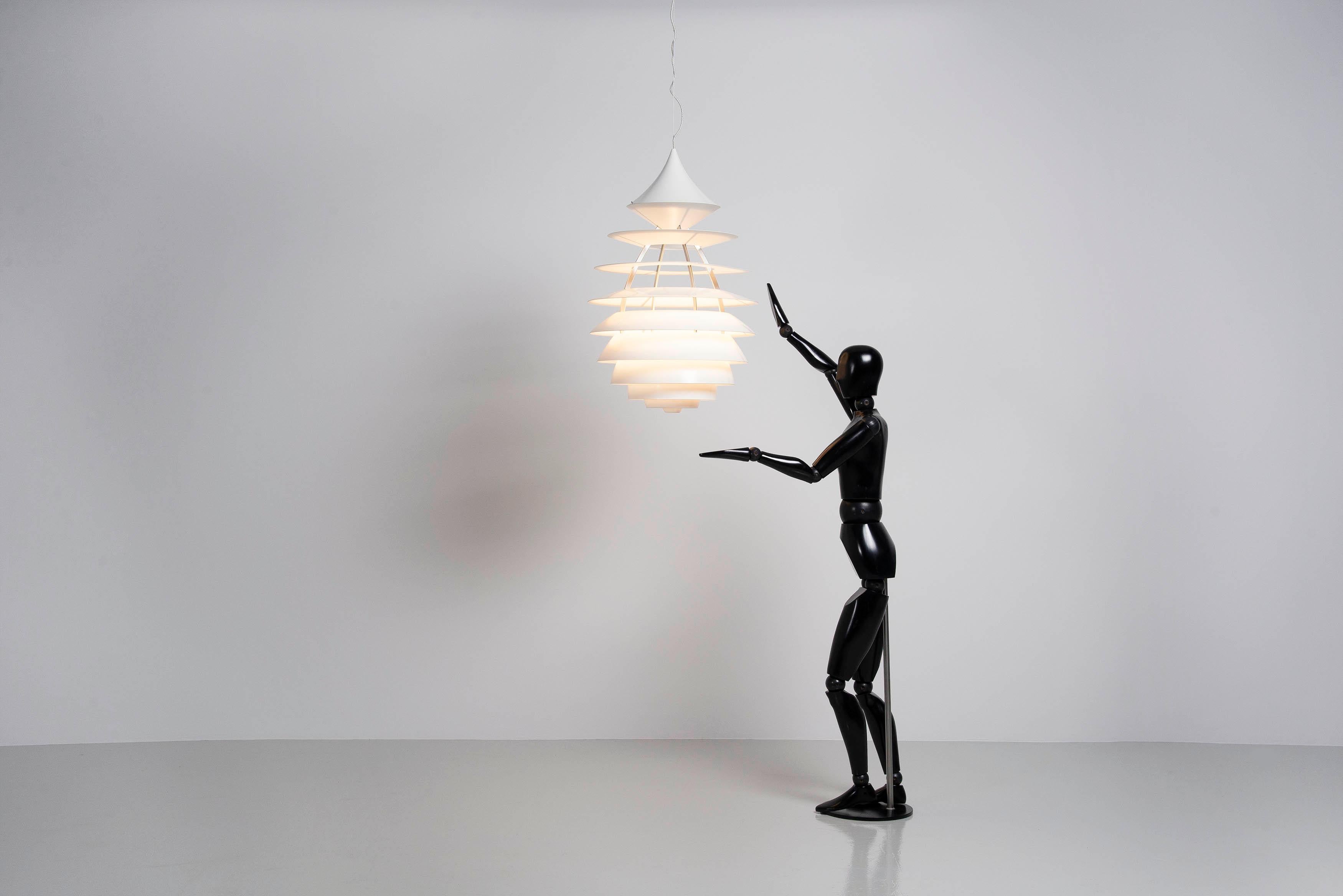 Monumental 'LP Centrum' chandelier designed by Kurt Norregaard and Poul Henningsen and manufactured by Louis Poulsen, Denmark 1990. This super nice and large sized chandelier has an aluminium structure with aluminium layered shades which give a very