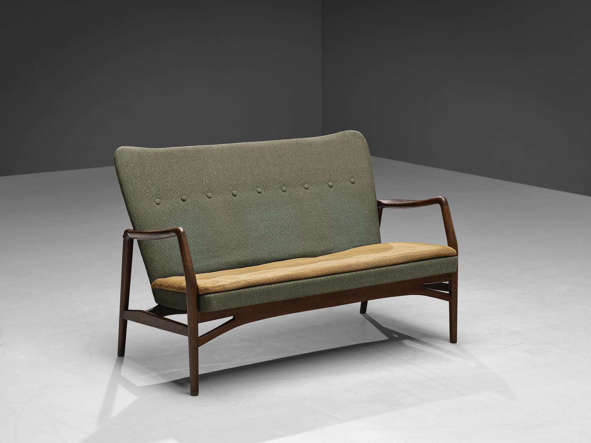 Kurt Olsen for A. Andersen & Bohm, love seat, wood, fabric, Denmark, 1951.

Stunning Danish loveseat designed by Kurt Olsen. This settee has a sculptural quality and light feeling. This is especially created by the floating wooden armrests and the