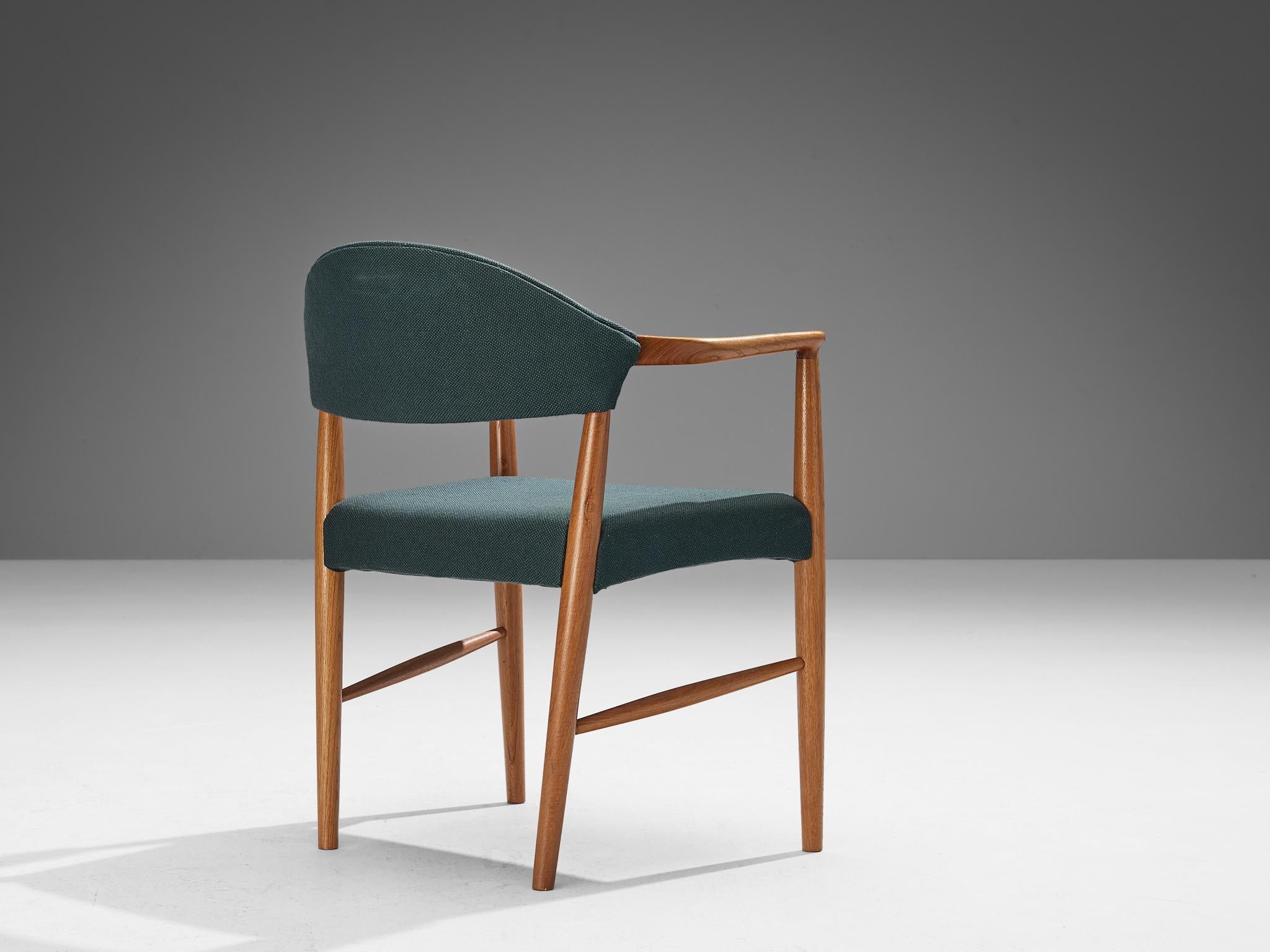 Kurt Olsen for Slagelse Mobelvaerk, dining chair, model 223, fabric, teak, Denmark, 1960s

This armchair is designed by Kurt Olsen for Slagelse Mobelvaerk and epitomizes comfort and functionality through its impeccably shaped armrests and ergonomic