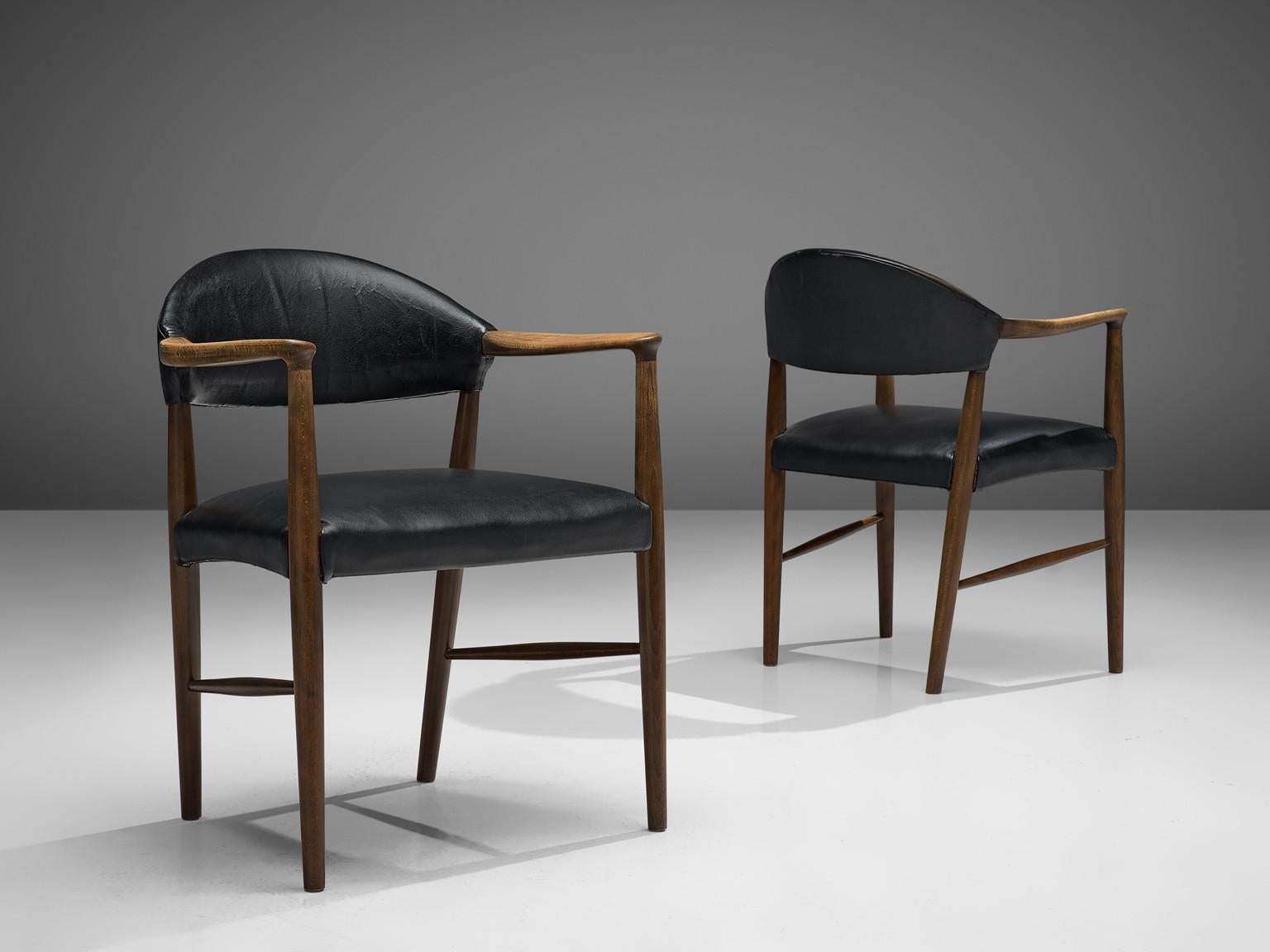 Kurt Olsen, dining chairs, leather, teak, Denmark, 1958.

Very comfortable dining chairs, due to well-shaped armrests and ergonomic proportions of the back and seat. The sculptural back is very attractive, as the beautifully curved bottom of the