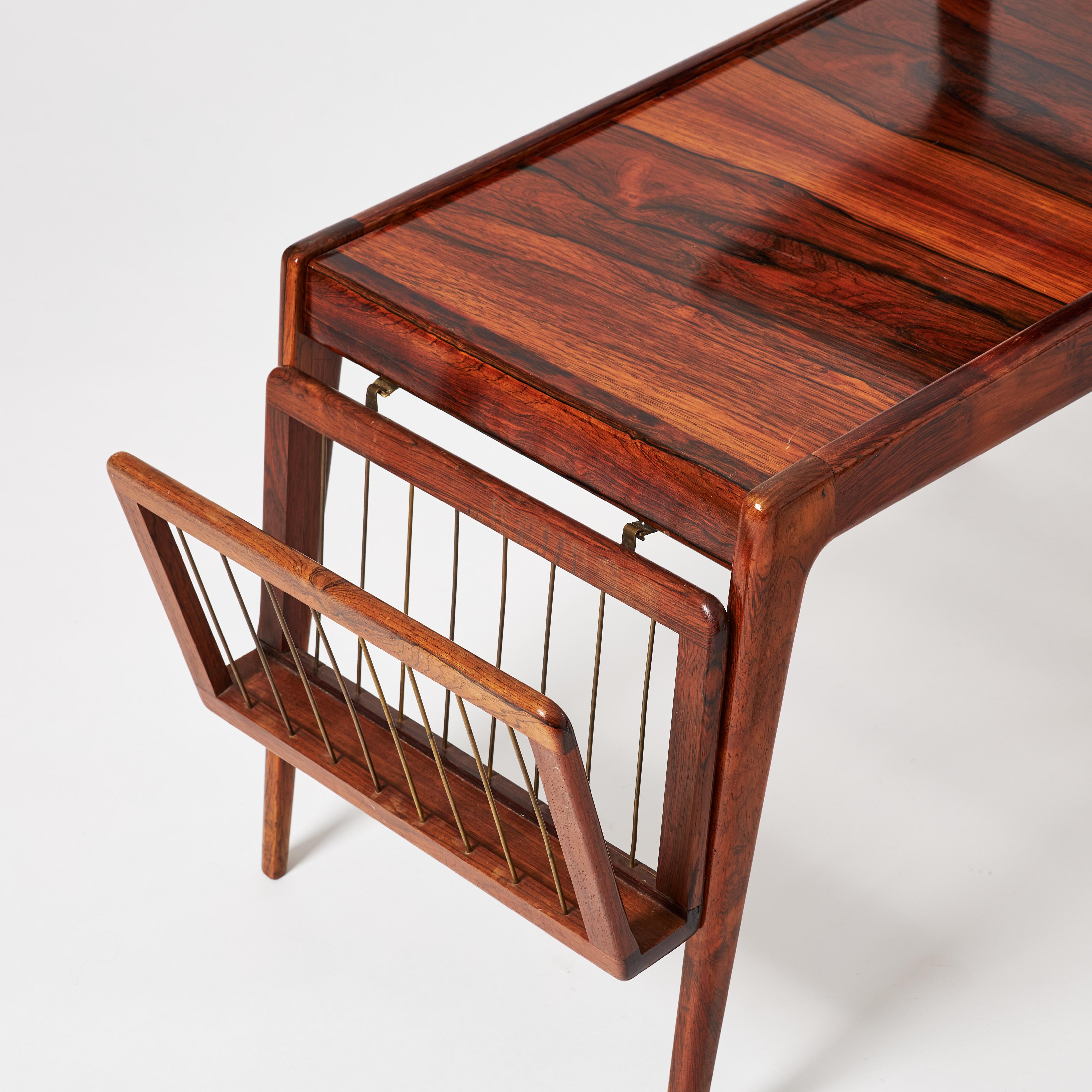 Kurt Ostervig A rpair of Jason Danmark side tables Denmark 1960 Signed
Very rare model with removable magazine rack in metal and wood.frame in Riopalisander (Dalbergia Nigra), stamped.
Length 80 cm, width 42 cm and height 63 cm.
side table or