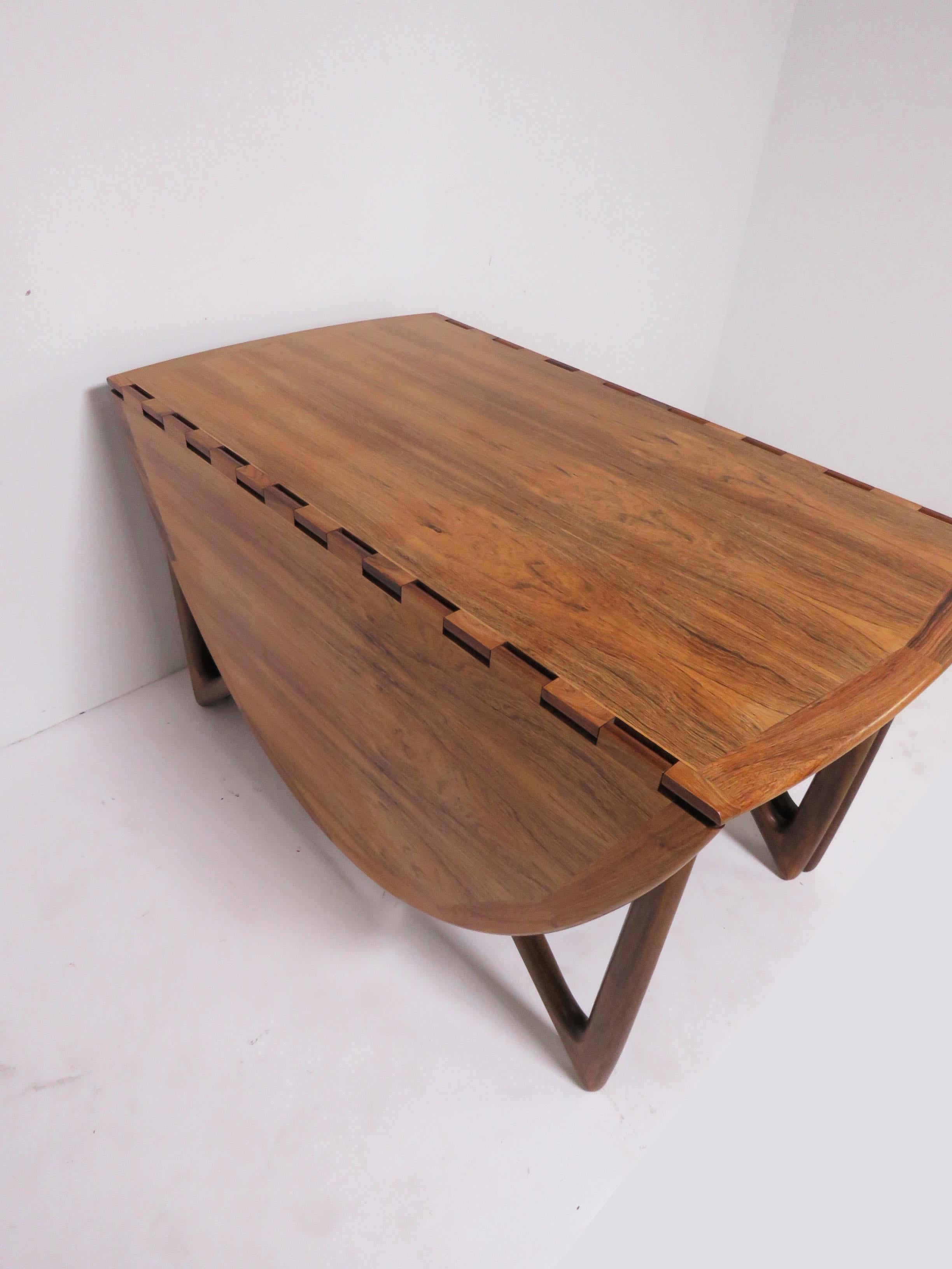 Kurt Ostervig Danish Rosewood Gate Leg Drop-Leaf Oval Dining Table, circa 1960s In Good Condition In Peabody, MA