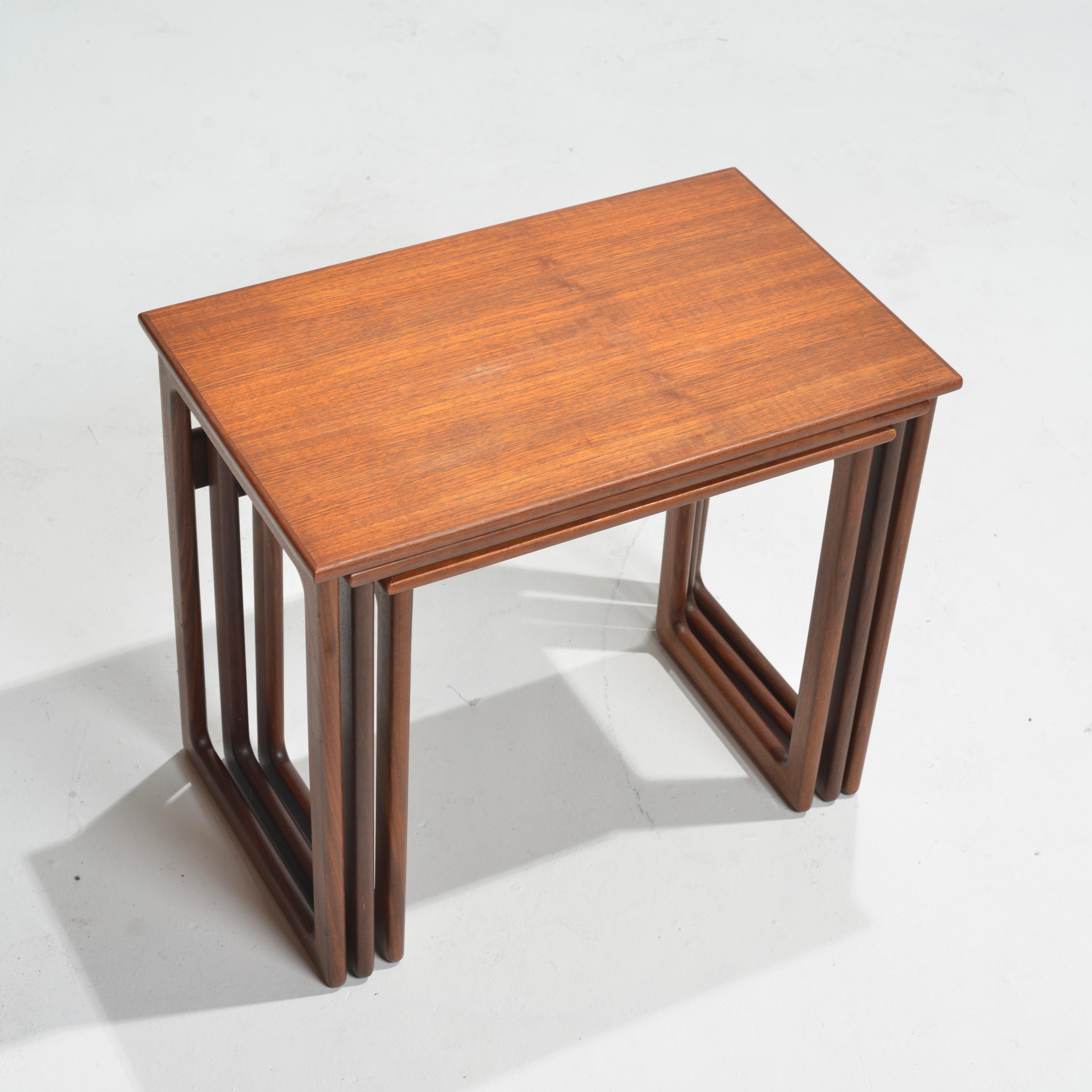 This is a stunning Nesting Table Set in teak by Kurt Østervig and masterfully executed by Jason Furniture in the 1960s. This set stands as a testament to Østervig's design prowess and the enduring charm of mid-century danish furniture. The versatile