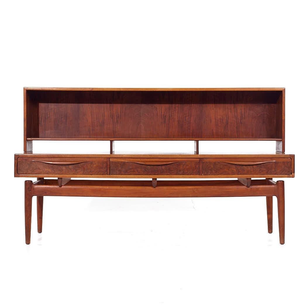 Kurt Ostervig Mid Century Danish Rosewood Low Credenza Bookcase

This credenza bookcase measures: 65 wide x 22.25 deep x 37.25 inches high

All pieces of furniture can be had in what we call restored vintage condition. That means the piece is