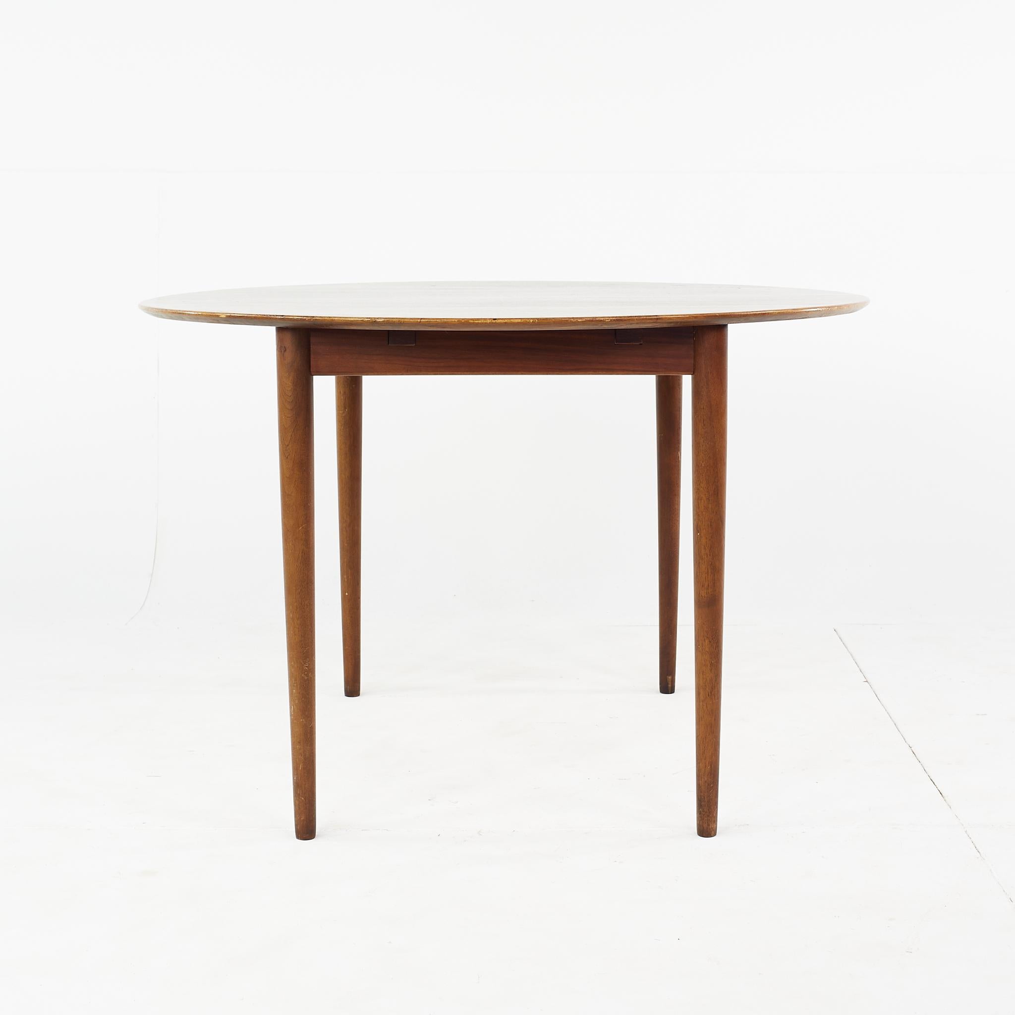 Danish Kurt Ostervig Mid Century Teak Expanding Round Dining Table For Sale