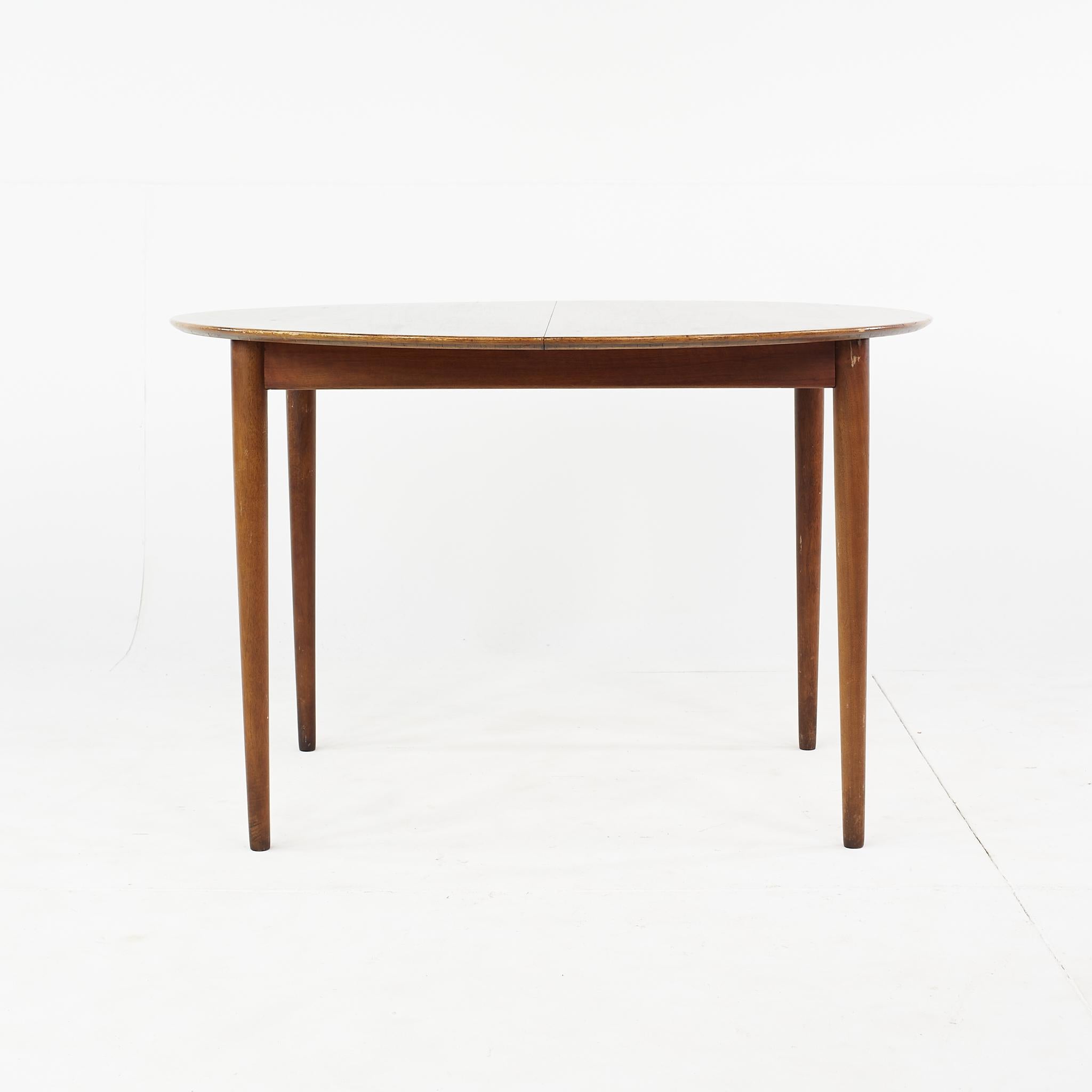 Kurt Ostervig Mid Century Teak Expanding Round Dining Table In Good Condition For Sale In Countryside, IL
