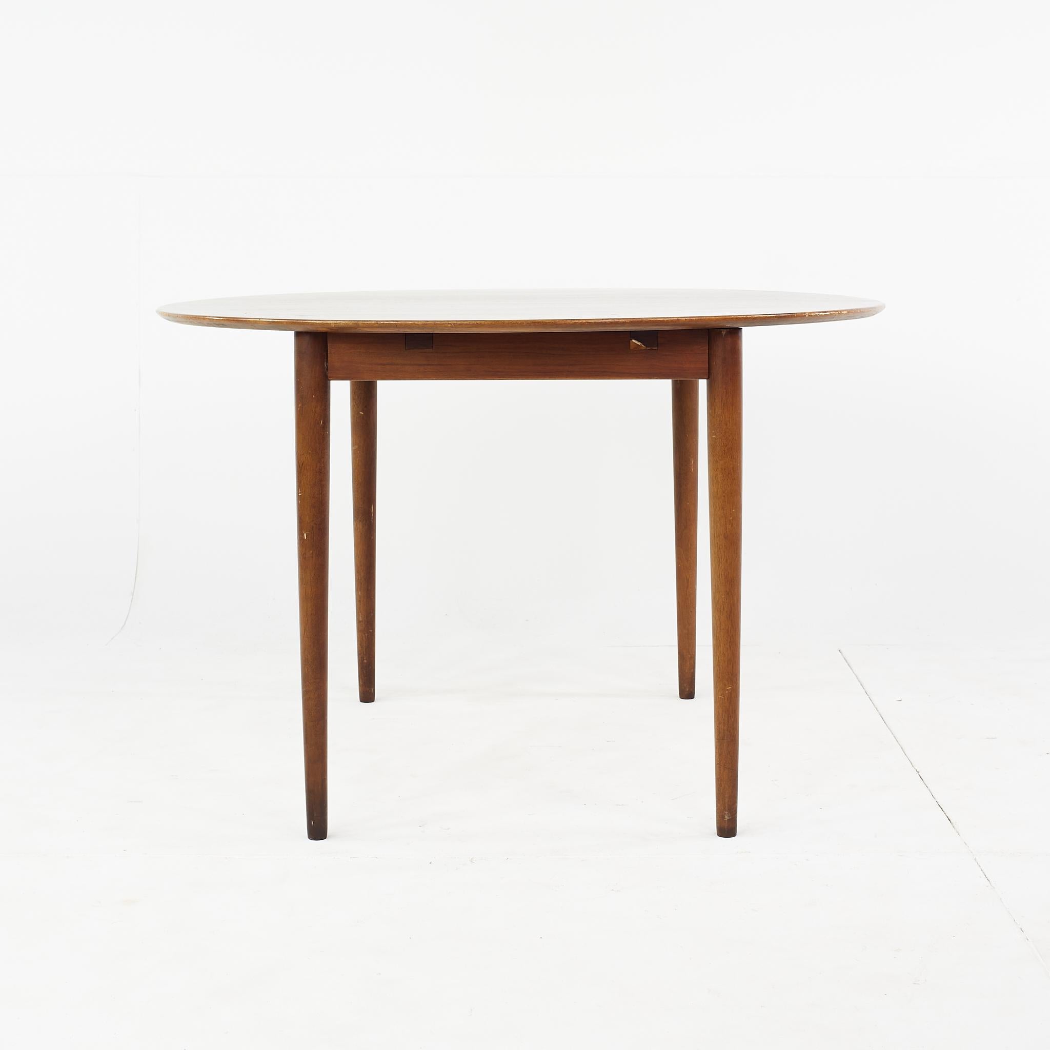 Late 20th Century Kurt Ostervig Mid Century Teak Expanding Round Dining Table For Sale