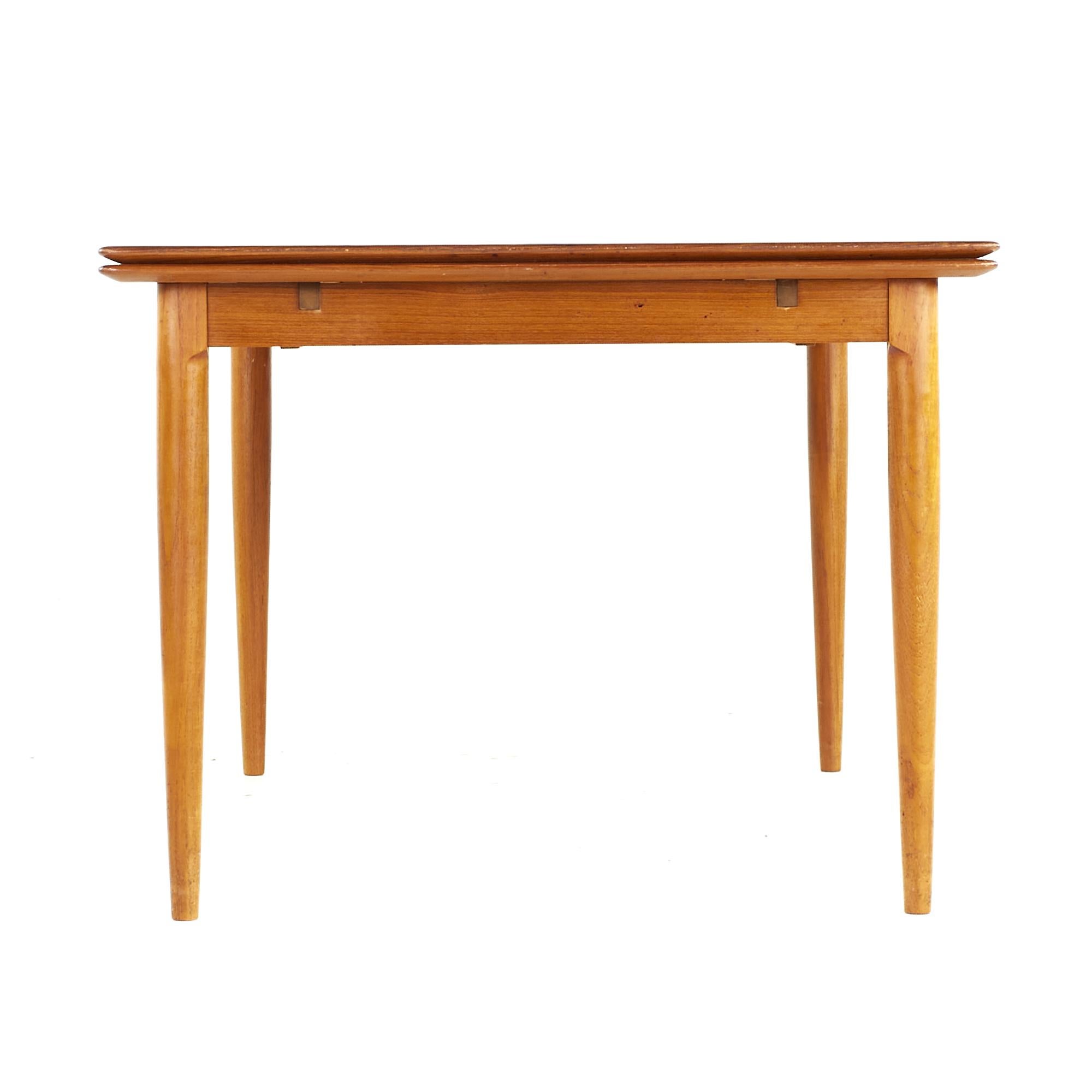 Late 20th Century Kurt Ostervig Style Midcentury Teak Dining Room Table with Hidden Leaves For Sale