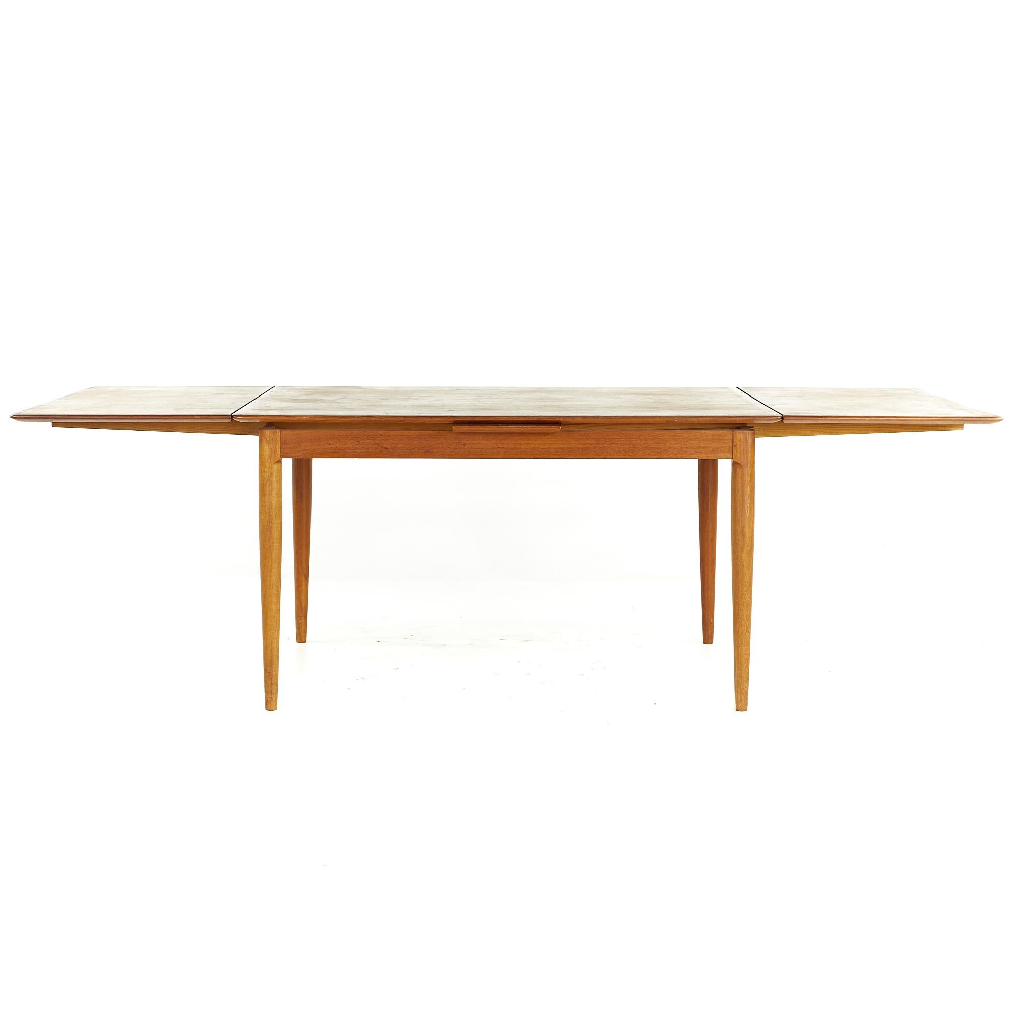 Kurt Ostervig Style Midcentury Teak Dining Room Table with Hidden Leaves For Sale 2