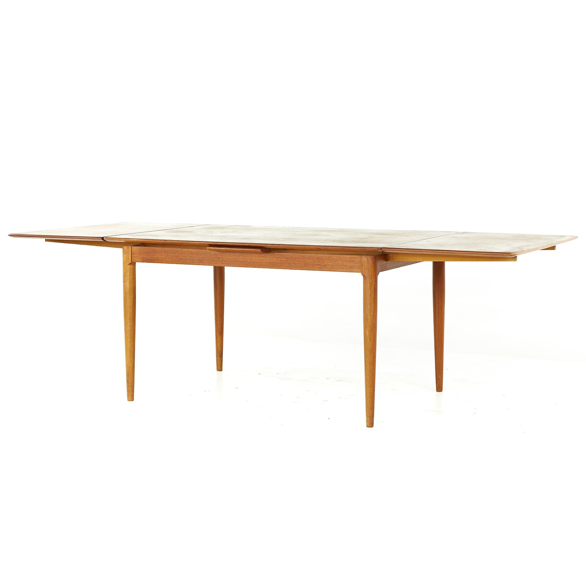 Kurt Ostervig Style Midcentury Teak Dining Room Table with Hidden Leaves For Sale 3