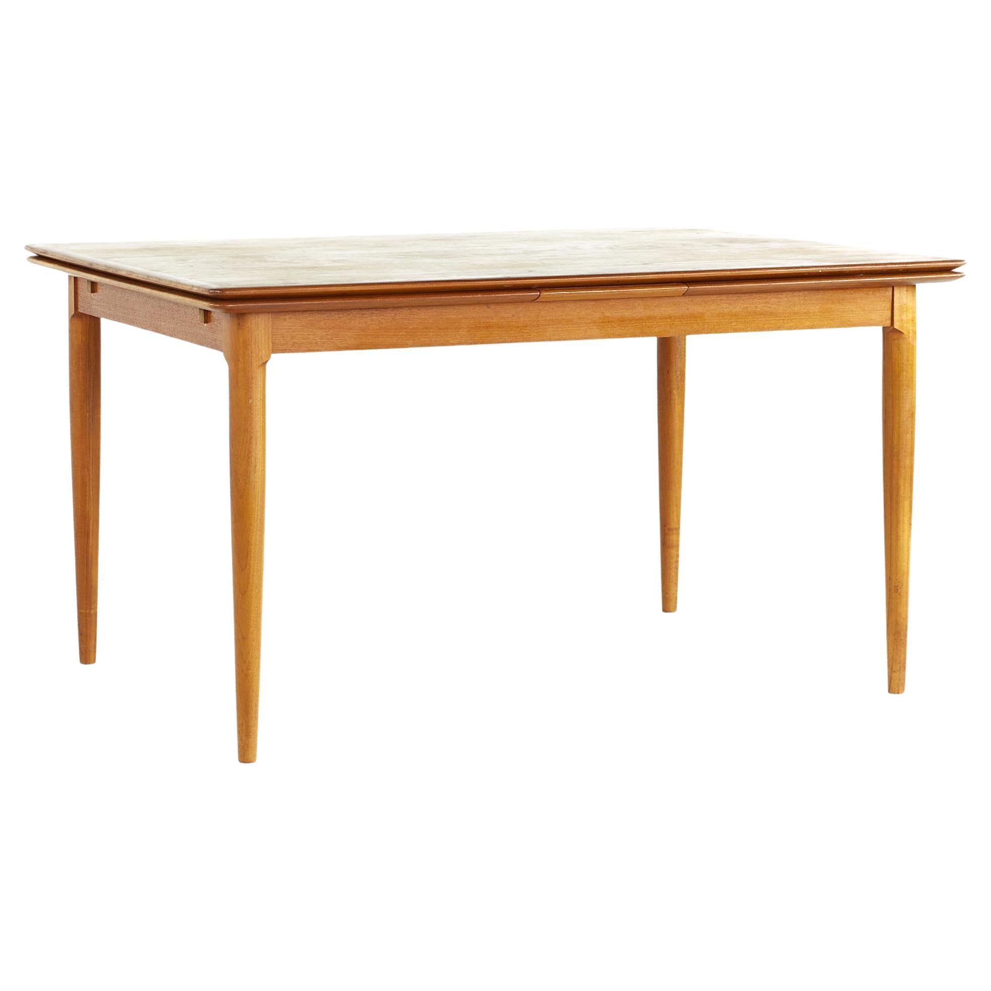 Kurt Ostervig Style Midcentury Teak Dining Room Table with Hidden Leaves For Sale