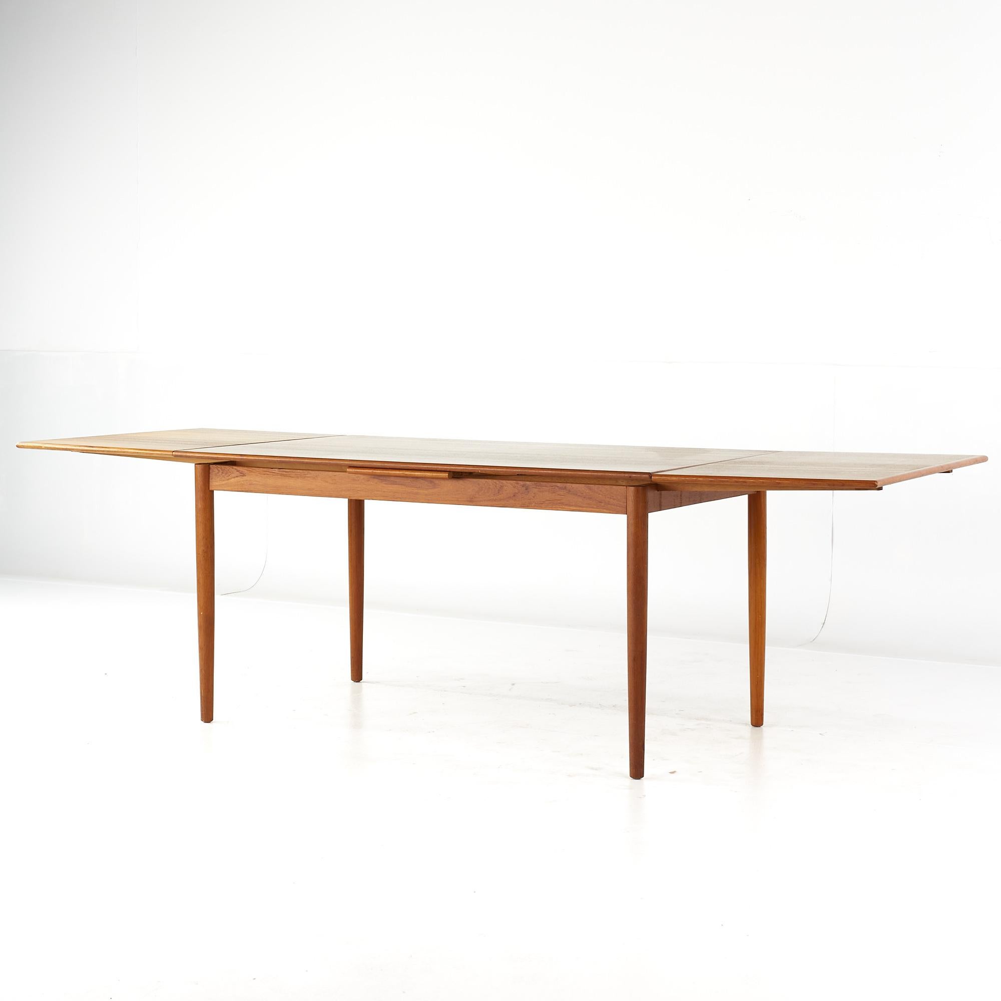 Kurt Ostervig Style Mid Century Teak Hidden Leaf Dining Table For Sale 4