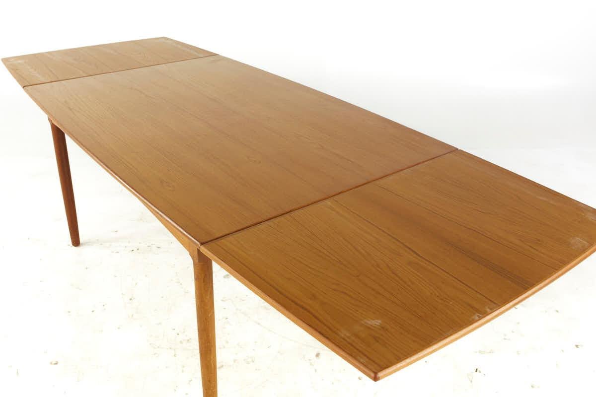 Kurt Ostervig Style Mid Century Teak Hidden Leaf Dining Table For Sale 1
