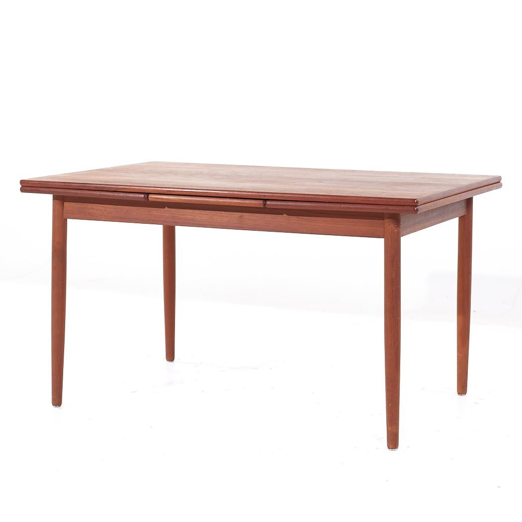 Mid-Century Modern Table de salle à manger en teck à feuilles cachées, style Kurt Ostervig, milieu de siècle en vente