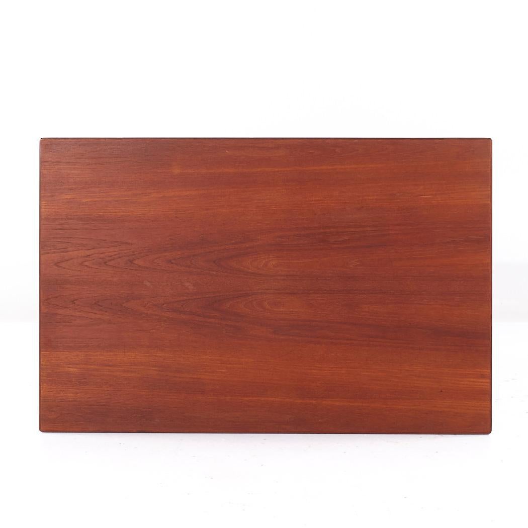 Fin du 20e siècle Table de salle à manger en teck à feuilles cachées, style Kurt Ostervig, milieu de siècle en vente