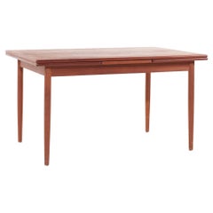 Table de salle à manger en teck à feuilles cachées, style Kurt Ostervig, milieu de siècle