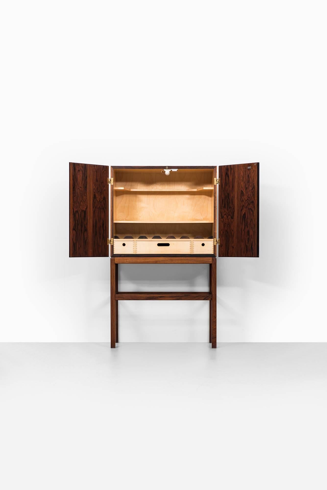 Mid-20th Century Kurt Østervig Bar Cabinet in Rosewood by K.P Møbler in Denmark