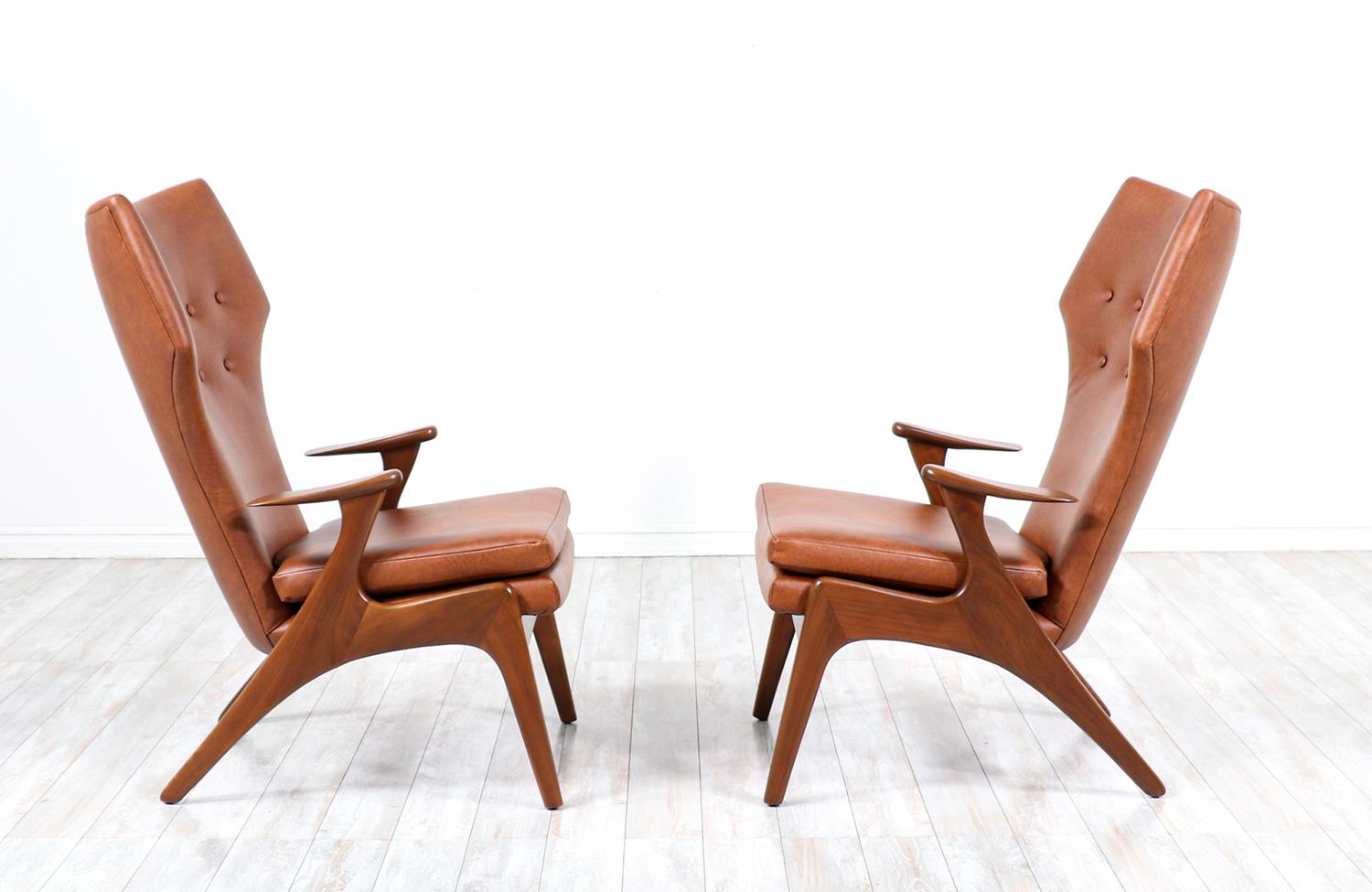 Danish Expertly Restored - Kurt Østervig Cognac Leather Wing Chairs for Rolschau Møbler For Sale