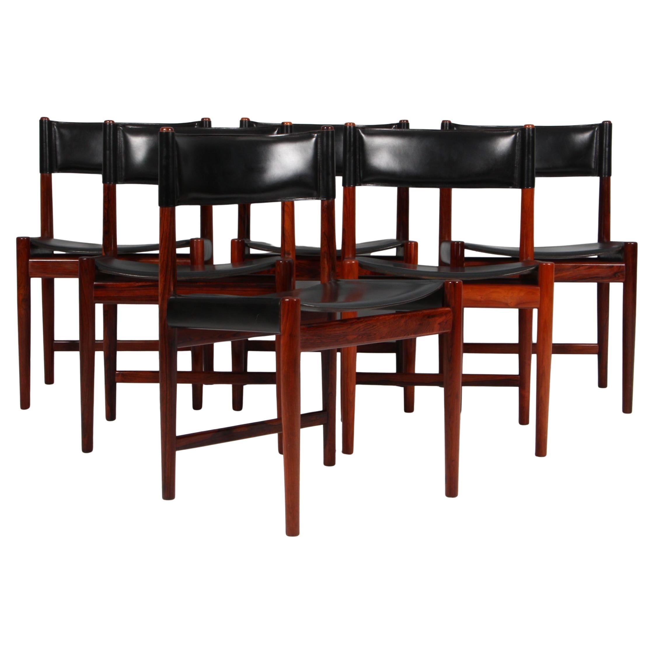 Kurt Østervig, sillas de comedor de madera de palisandro y piel de tope negra en venta