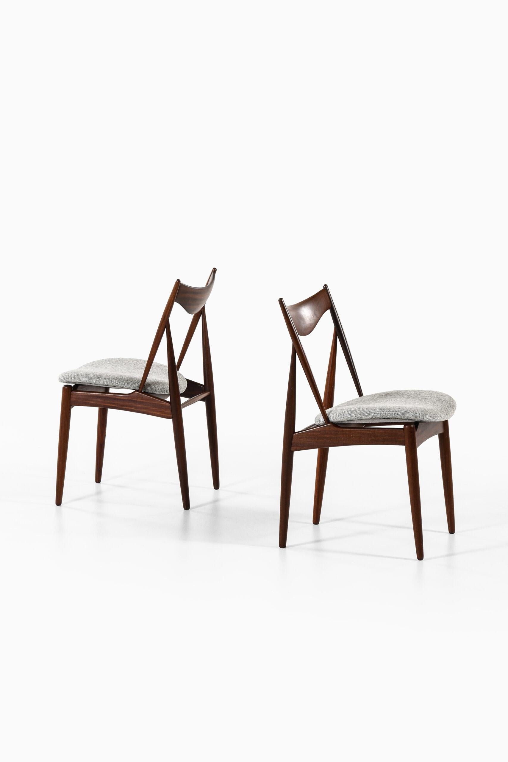 Very rare set of 10 dining chairs designed by Kurt Østervig. Produced by Bramin in Denmark.