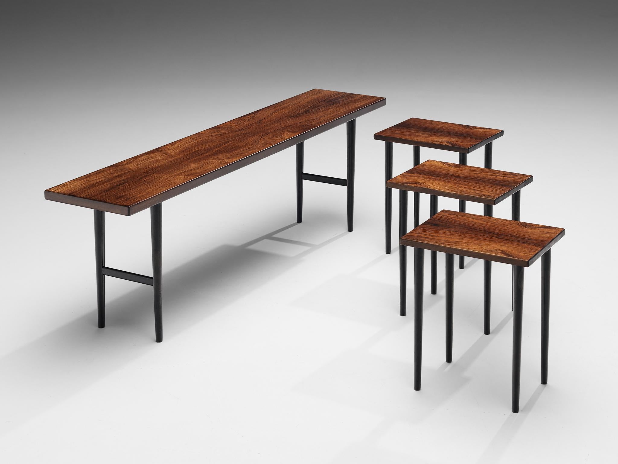 Kurt Østervig for Jason Møbler, set of four side tables model 200, rosewood, wood, Denmark, 1956

Rare set of four nesting table by Danish designer Kurt Østervig for Jason Møbler. The model 200 was designed in 1956 with a long table under which the