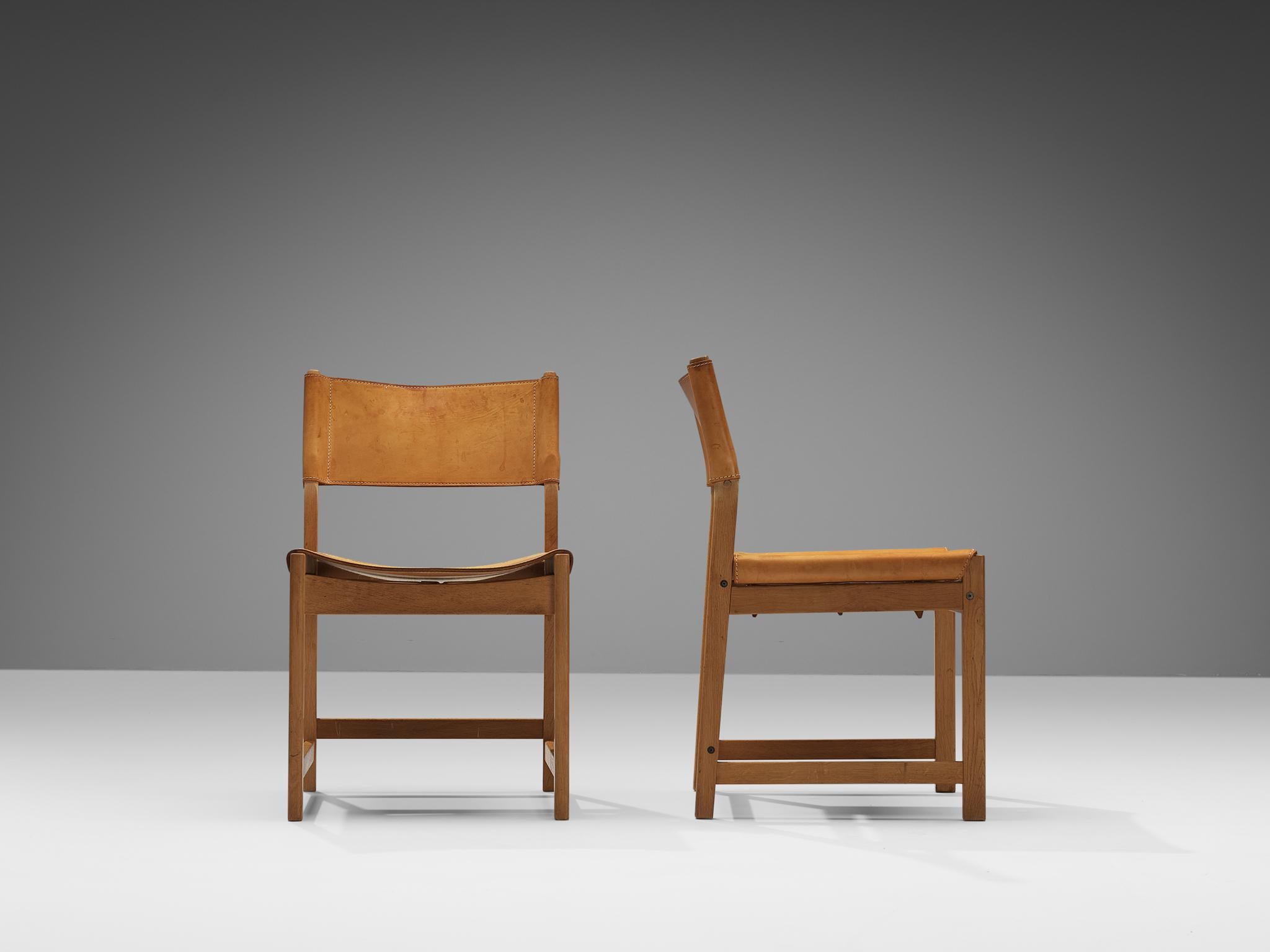 Danish Kurt Østervig for Sibast Pair of Dining Chairs in Cognac Leather and Oak  For Sale