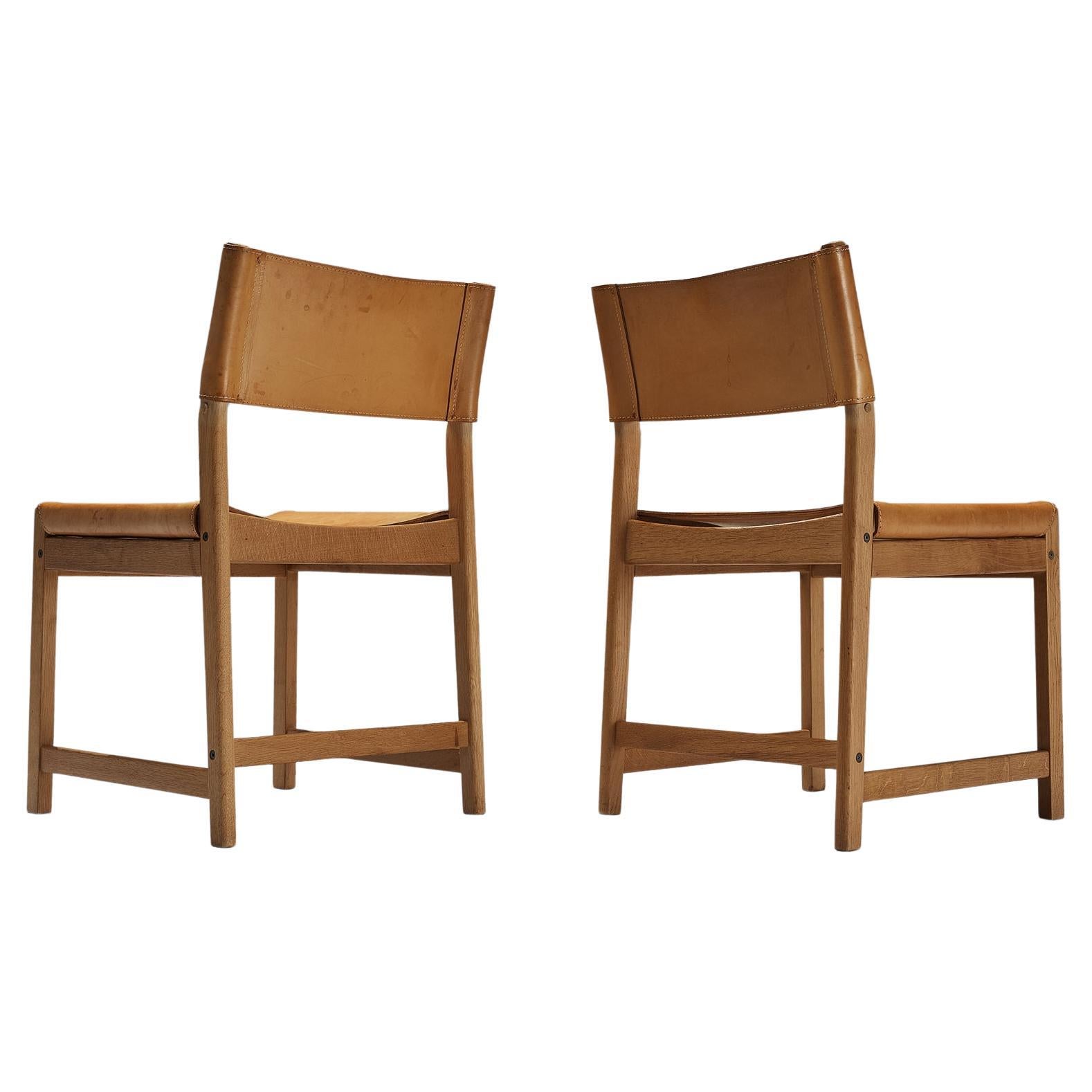 Kurt Østervig for Sibast Pair of Dining Chairs in Cognac Leather and Oak  For Sale