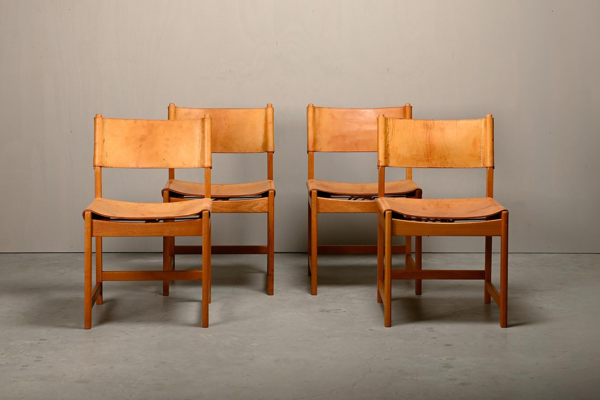 Danish Kurt Østervig hunting Dining Chairs in Oak and Cognac Leather for KP Møbler