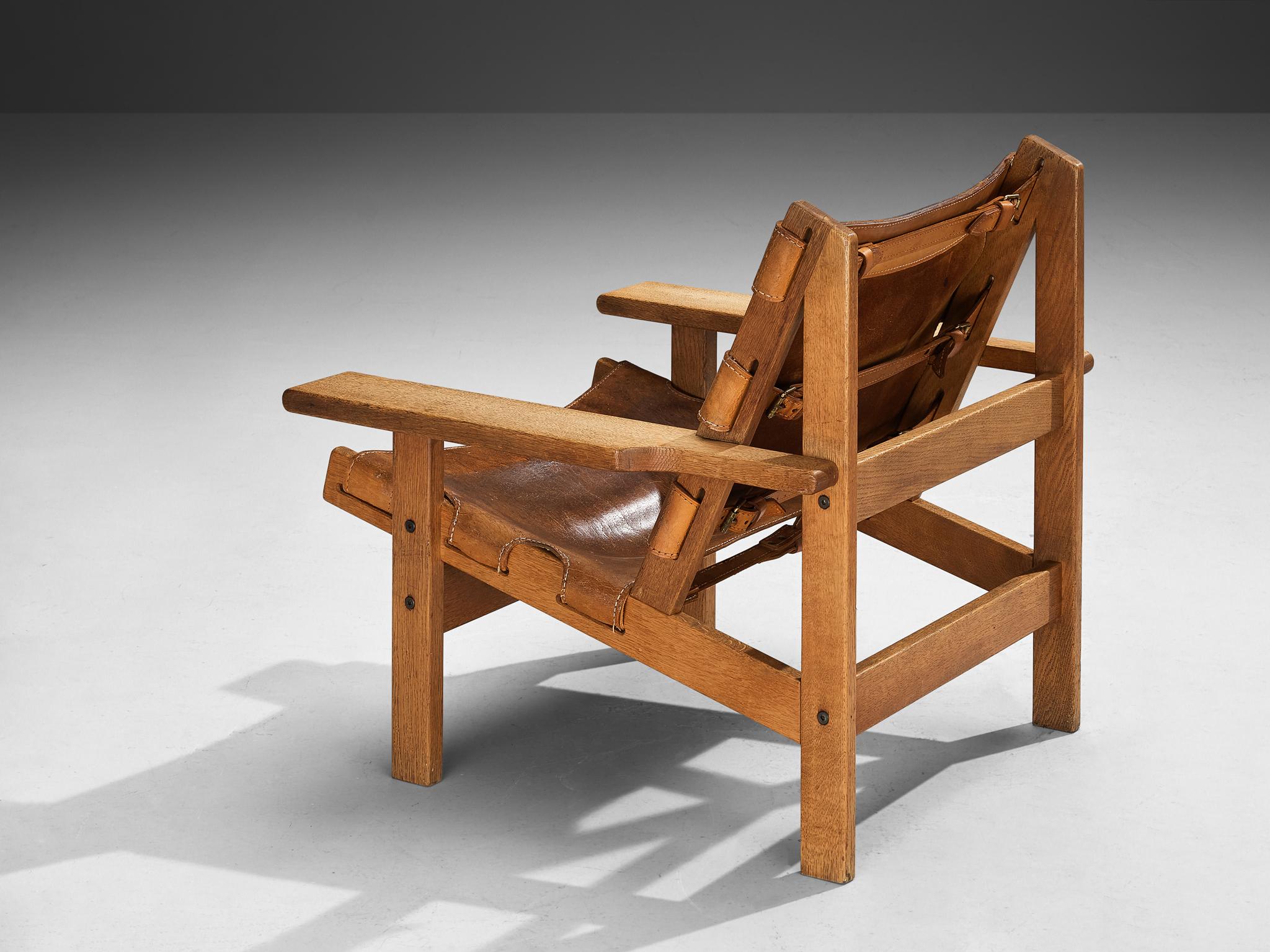 Mid-20th Century  Kurt Østervig 'Hunting' Lounge Chair in Cognac Leather and Oak  For Sale