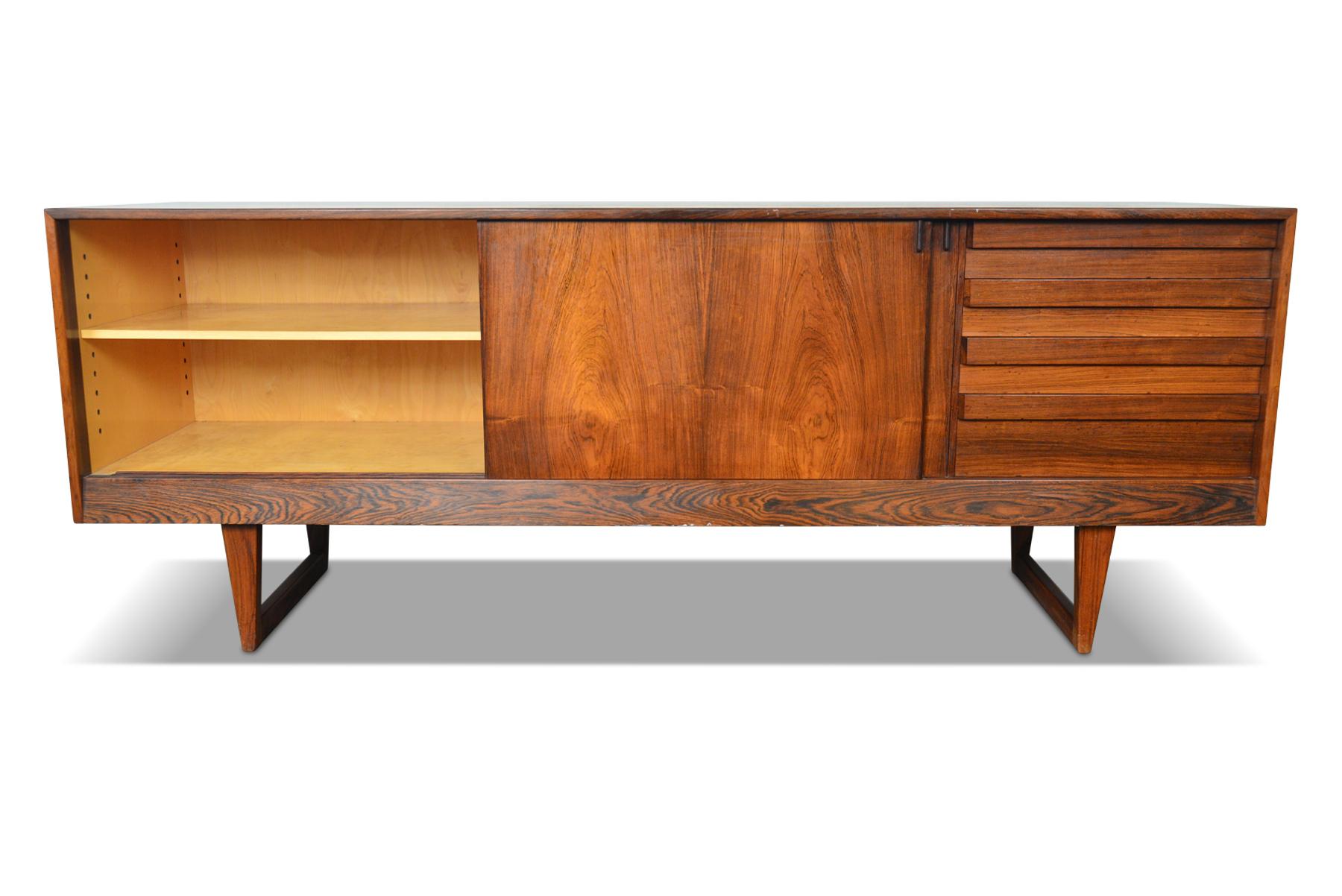 Origin: Denmark
Designer: Kurt Østervig
Manufacturer: KP Mobler.
Era: 1960s.
Materials: Rosewood.
Measurements: 83 wide x 21.5 deep x 31.5 tall.

Condition: In excellent original condition with typical wear for its vintage. Price includes a