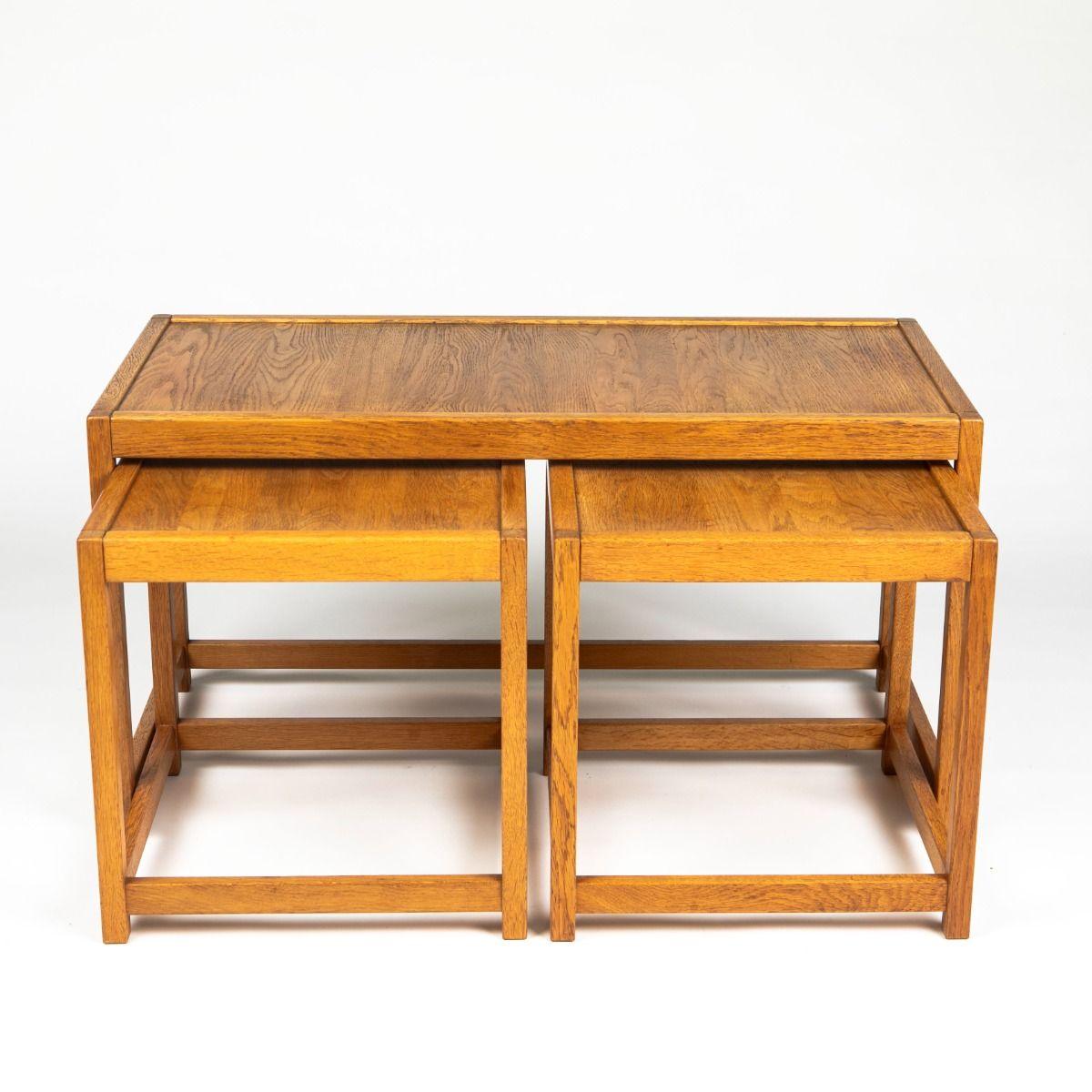 Kurt Østervig Design.

Set of nesting tables (3) crafted in solid oak for KP Møbler, circa 1970.
In beautiful condition with a light refinish.
Dimensions:
Coffee table: 48 x 91 x 45 cm
Side tables: 42.5 x 42 x 42 cm
