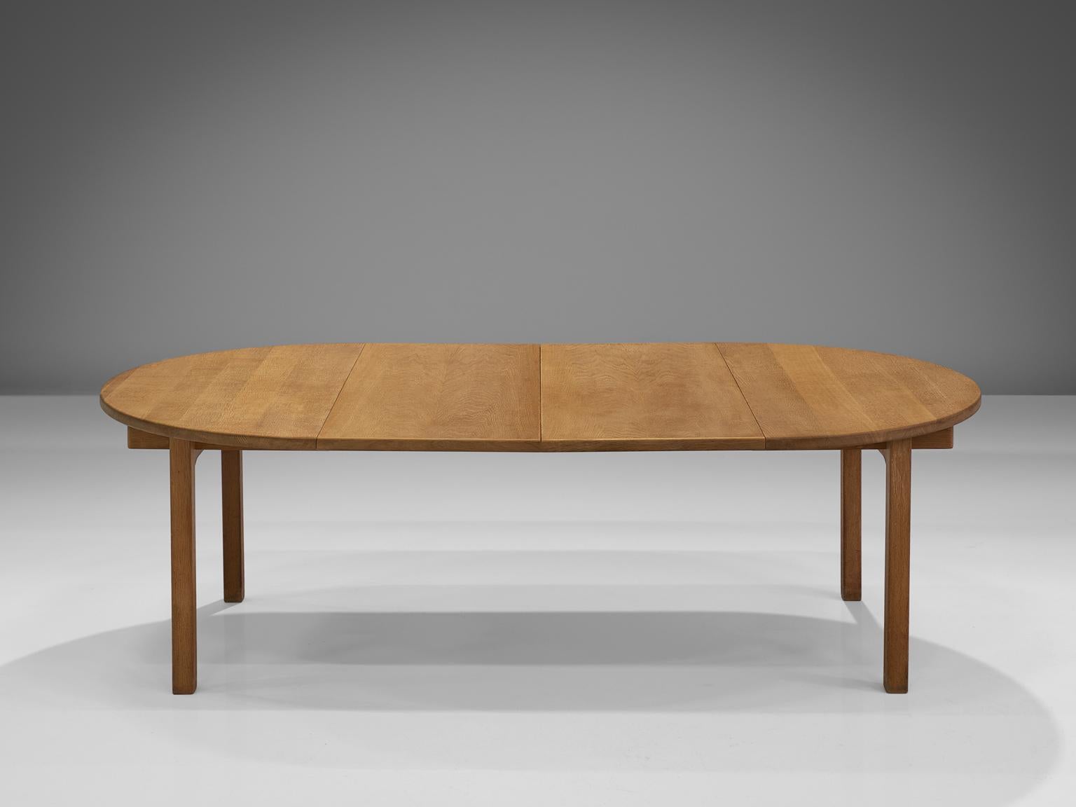 Kurt Østervig by KP Møbler, oak, Denmark, 1960s.

This extendable table in solid oak was designed in the 1960s by Kurt Østervig. The Danish design is solid, modest and well-constructed. The table can be extended or used as a circular, small