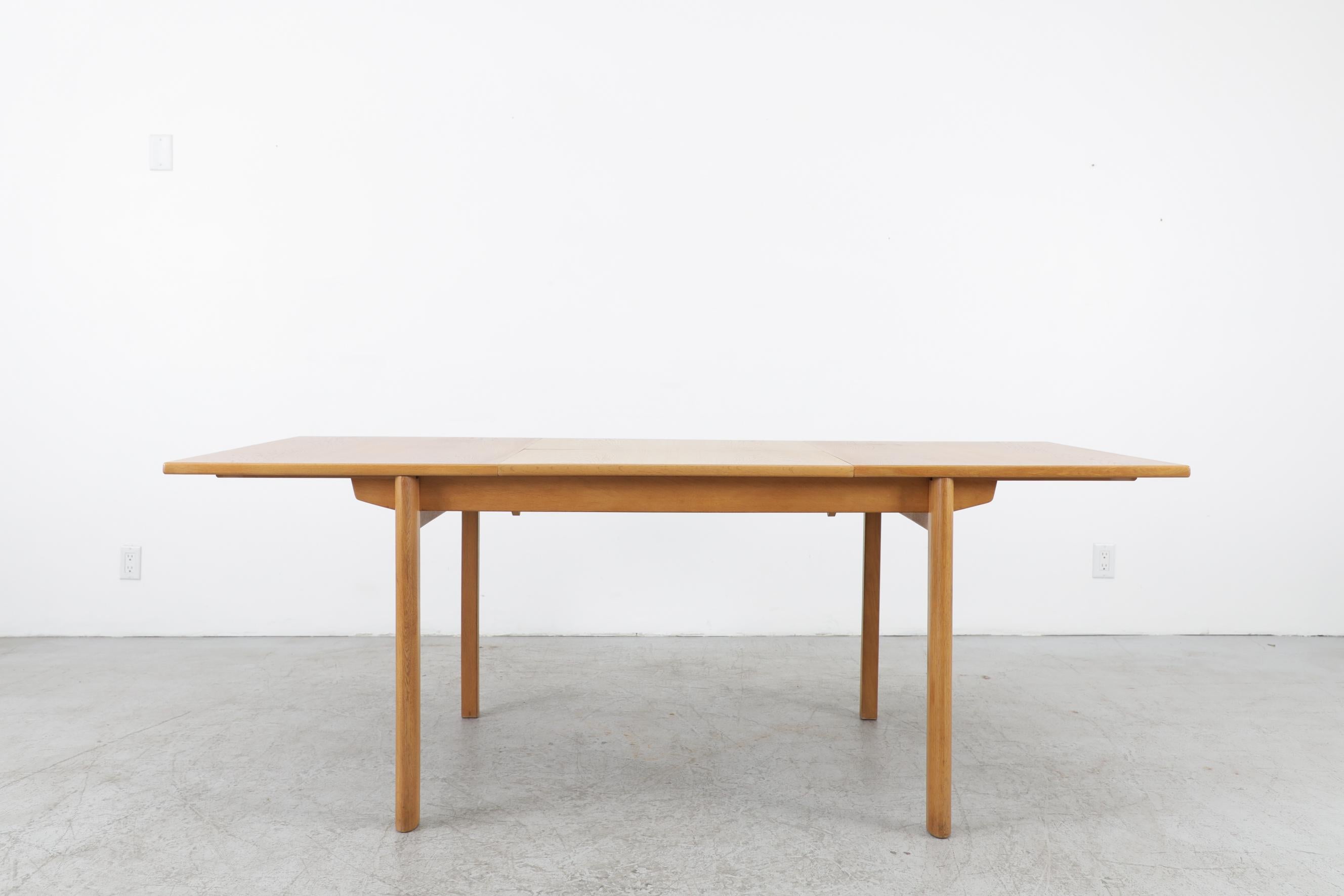 Kurt Østervig designed oak dining table with butterfly leaf. The leaf measures 27